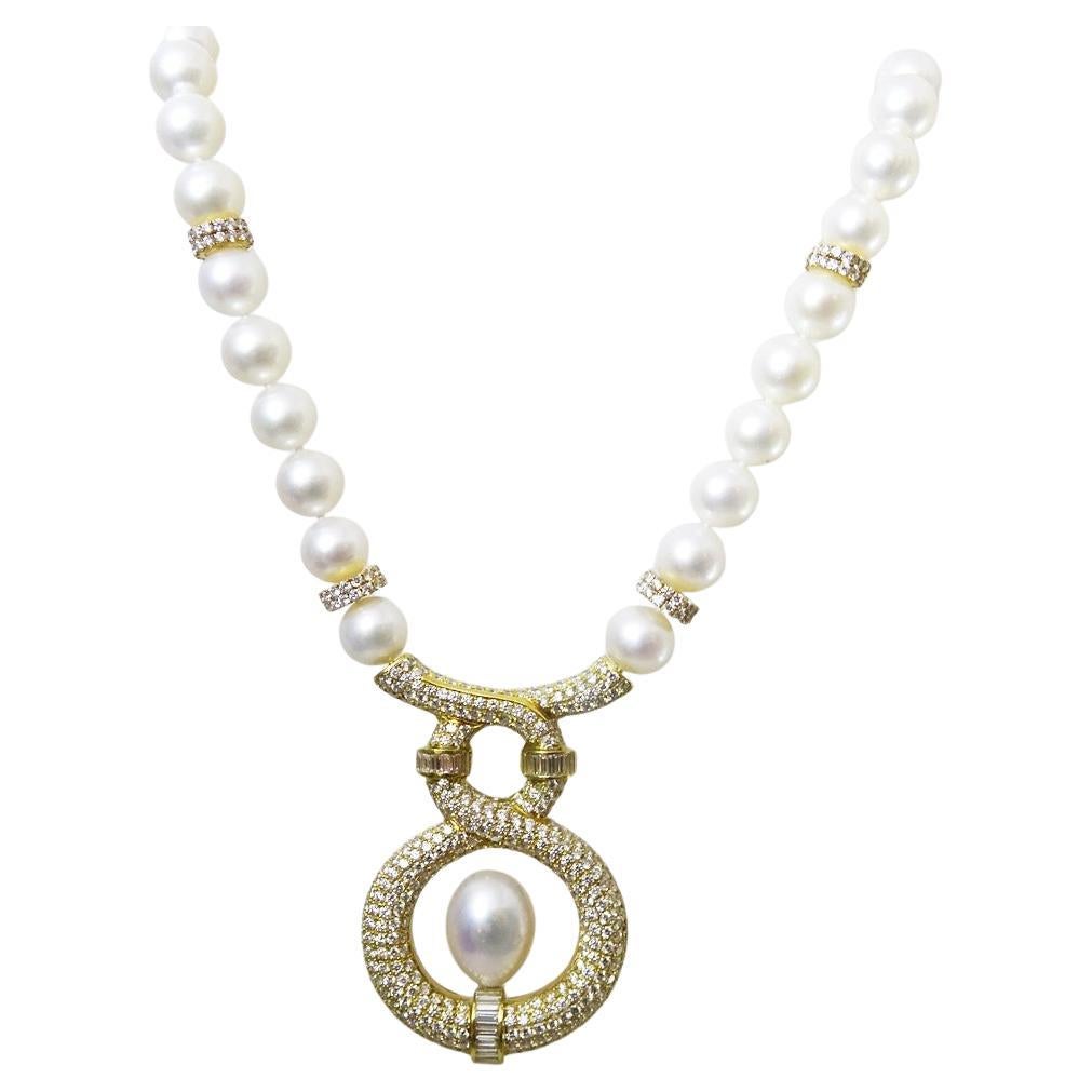 A Striking Pearl and Diamond Necklace by the renowned Israeli Designer Yvel.
The Pearls are Akoya Pearl 9.5 - 10 mm.
The gold is 18 karat all clearly hallmarked.
There are over 500 1.8 mm Diamonds as well as 24 baguette diamonds measuring 1.5 mm x 3