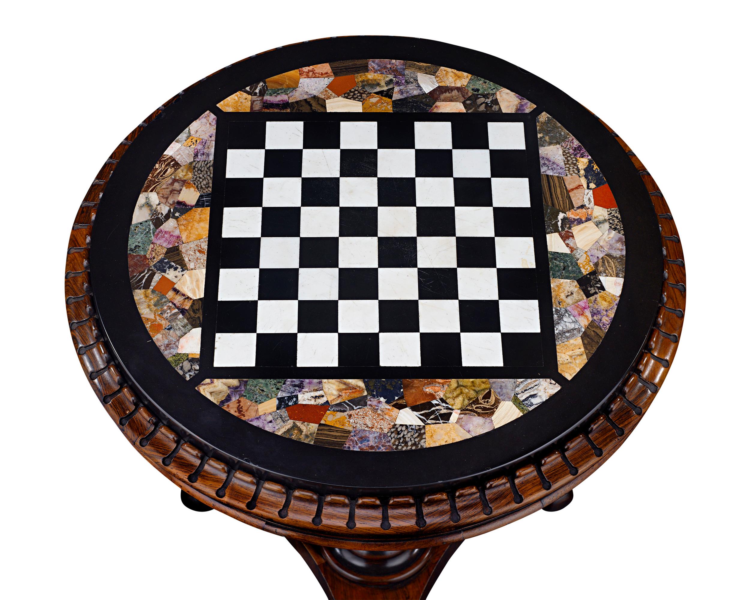 This magnificent games table incorporates some of the rarest English marbles, hardstones and fossil specimens, including Derbyshire Blue John. The scarcity of these coveted stones makes an inlaid circular piece of this size a truly exceptional and