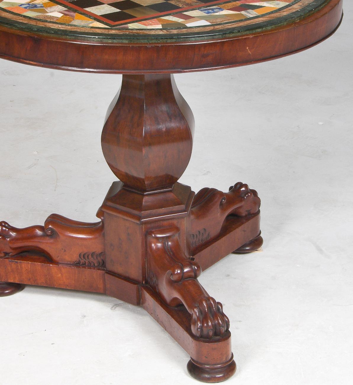 A late Victorian pedestal center table with a later inset specimen marble top
with the center a chess table.
circa 1890
Measures: Height 28 in
Diameter 31 in.
