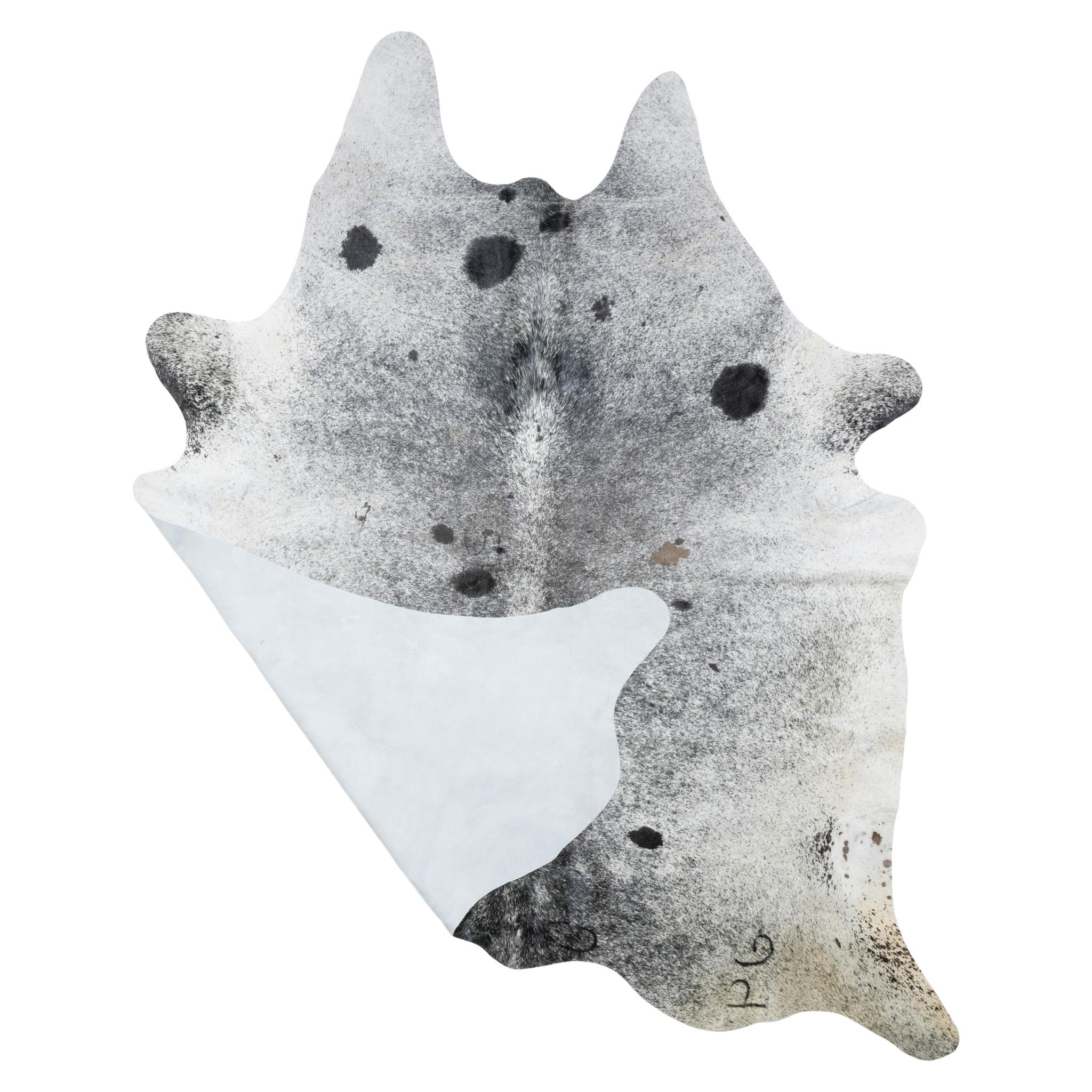 Peau de corne de buffle mouchetée de noir et de blanc. Contemporain. Whiting est de couleur blanche avec des mouchetures noires et grises et des taches noires éparses. La marque 
