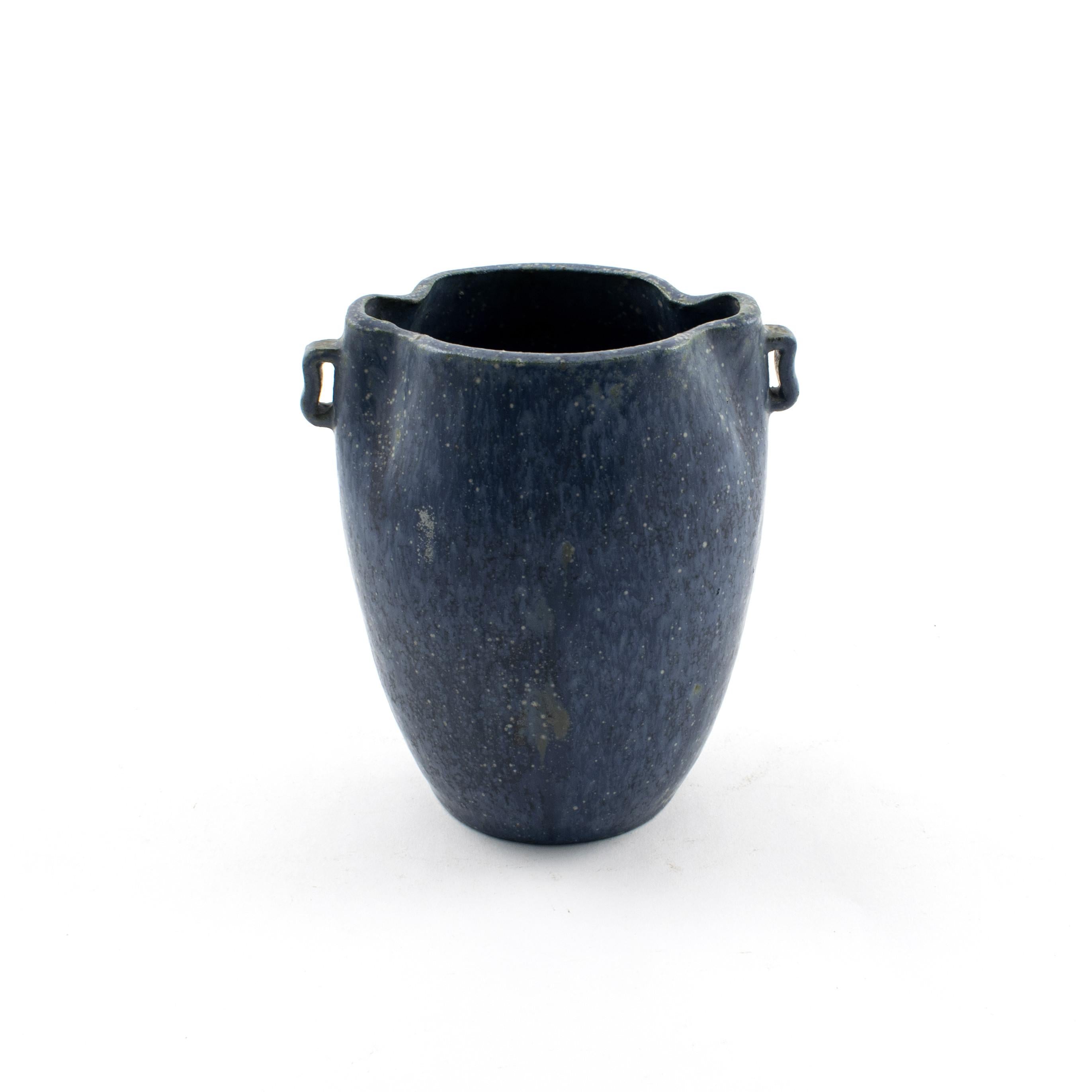 Stoneware vase by Arne Bang with small side handles.
Dark speckled blue matte glaze.
Signed with monogram AB.