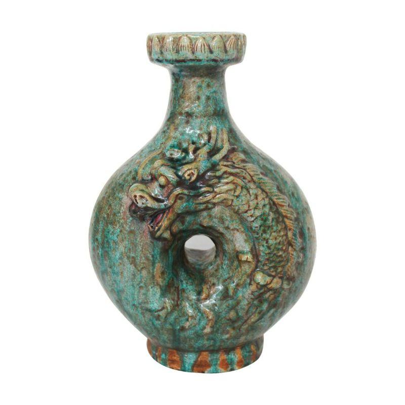 Speckled Green Embossed Dragon Vase

Shape: Vase
Color: Green
Size (inches): 11W x 7D x 17H

Warranty Information: Each piece was handcrafted by skill and joy. Imperfection is part of the characters. Minor variation of color/shape/size is
