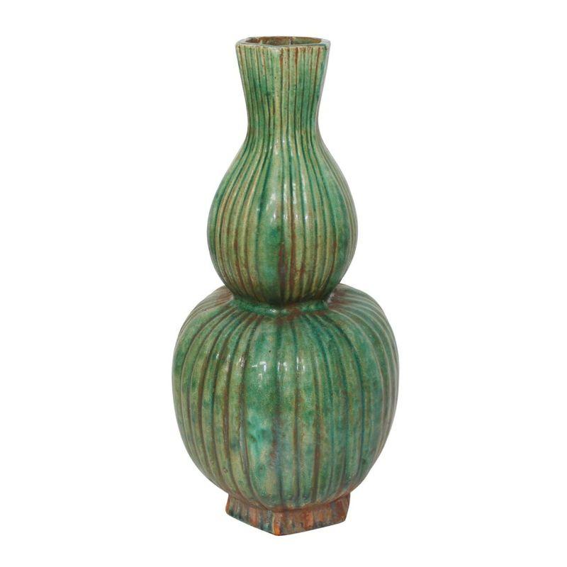 Speckled green hexagonal fluted gourd vase

Shape: Vase
Color: Green
Size (inches): 8W x 8D x 16H

Warranty Information: Each piece was handcrafted by skill and joy. Imperfection is part of the characters. Minor variation of color/shape/size