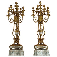 Spectaculaire paire de candélabres de style Louis XVI