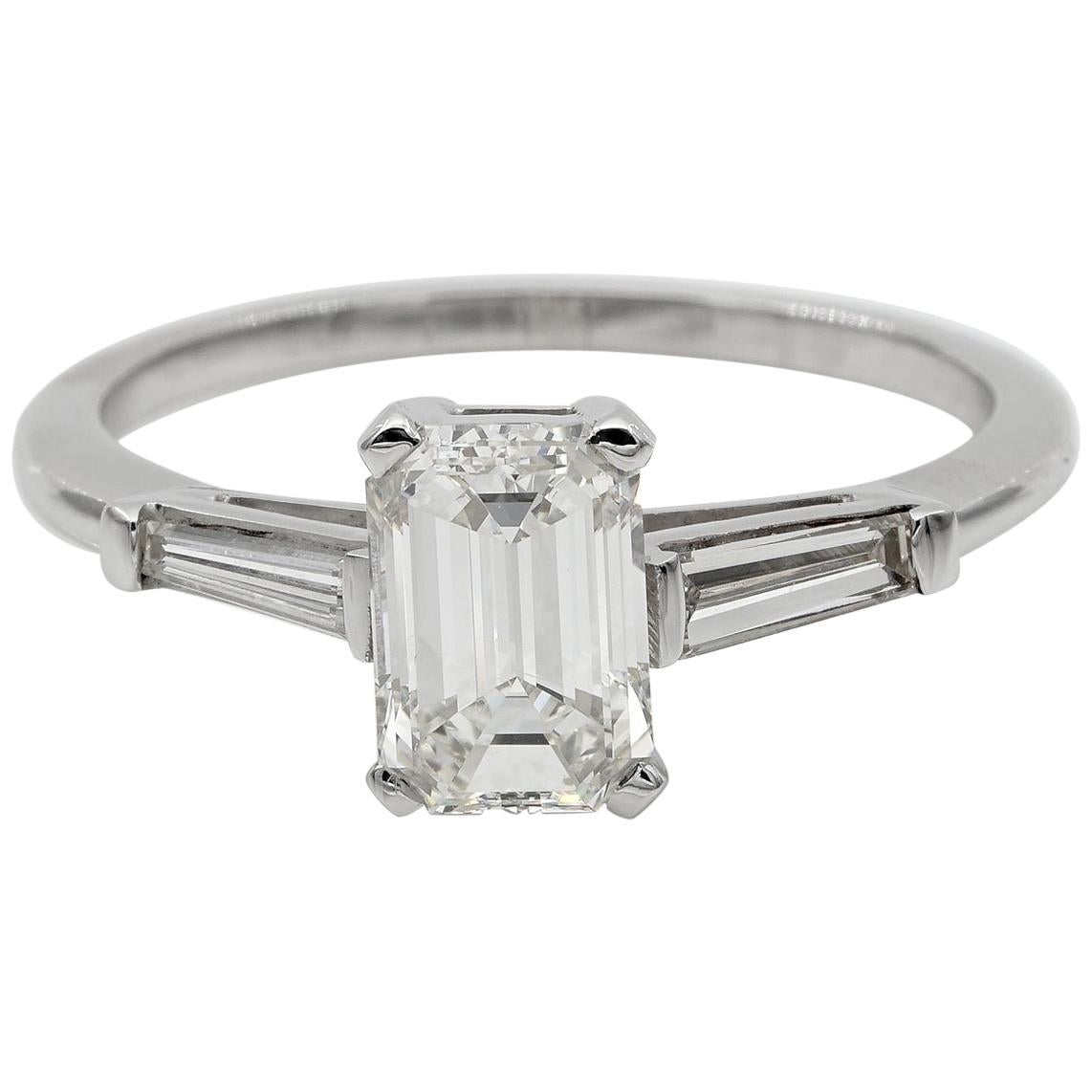 Spectacular 1.21 Carat Emerald Cut Diamond G VVS1 Tapered Diamond Side Ring For Sale