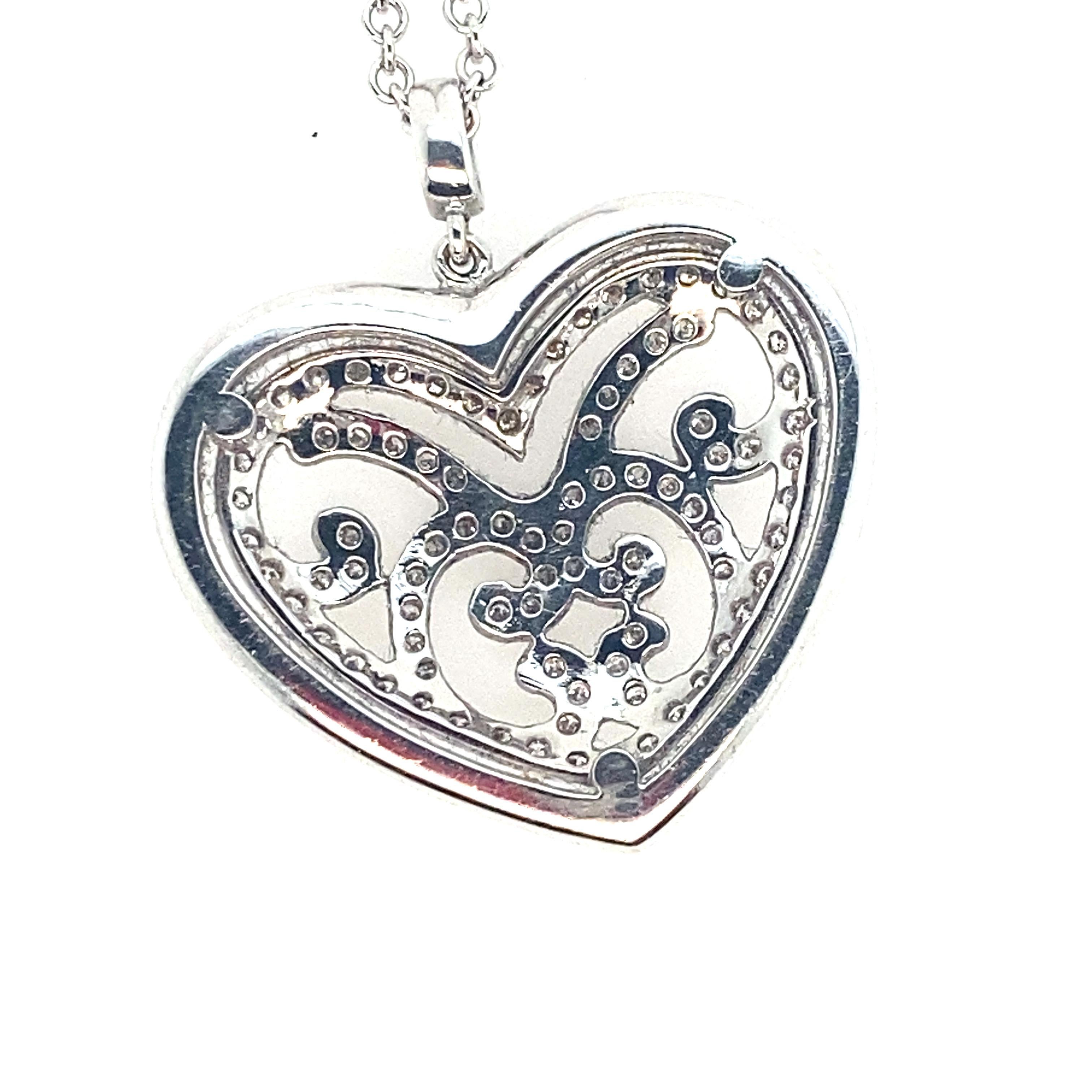 A wonderful, unusal, 18kt and diamond heart pendant.  The pendant has 1.00 cts of round, brilliant diamonds that are H color, VS2-SI1 clarity.  It is not your ordinary heart pendant.  The design is sophisticated and a good medium size.  It is on a