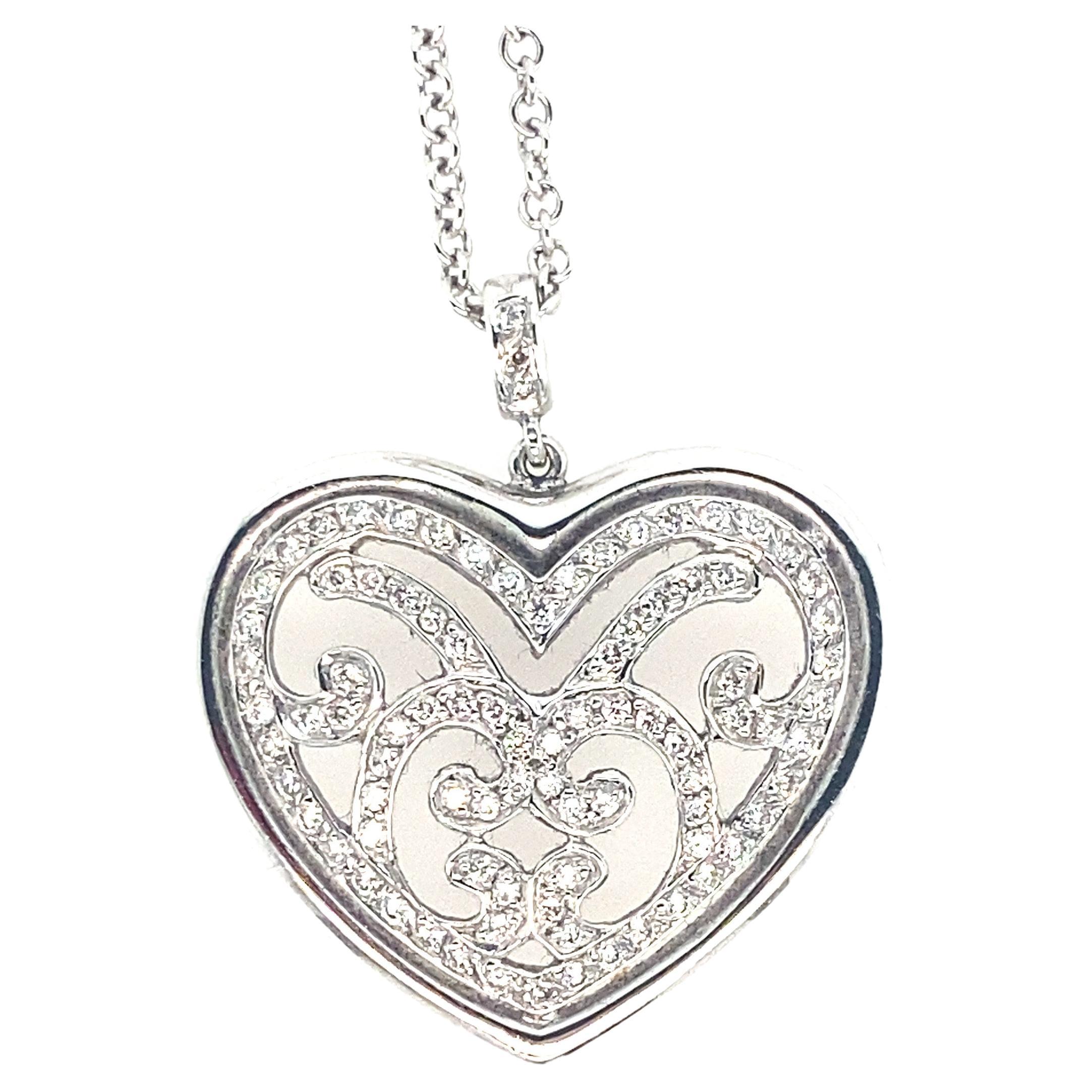 Spectaculaire pendentif et chaîne en forme de cœur en or 18 carats et diamants en vente