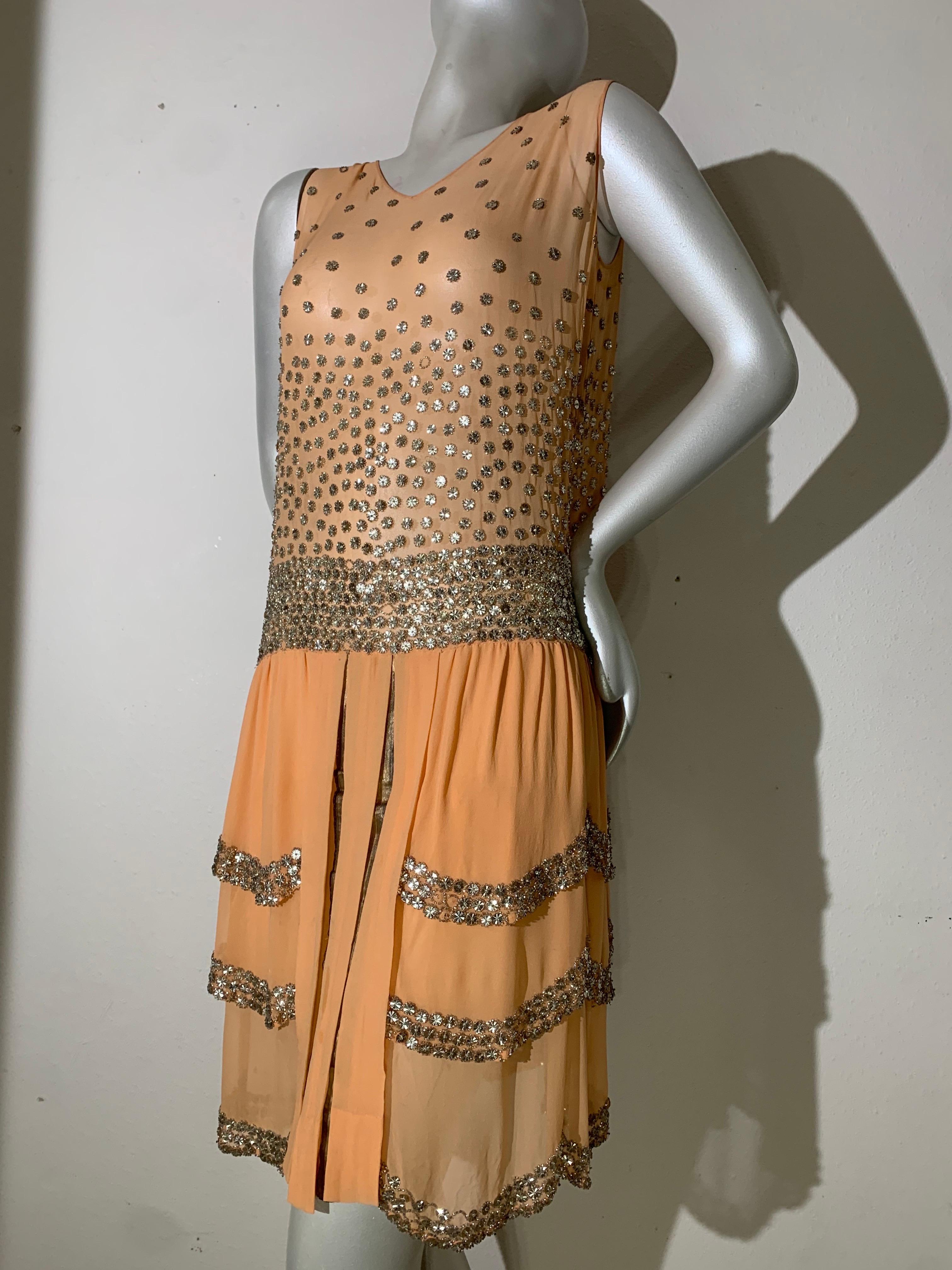 Spectacular 1920s Apricot Silk Chiffon Evening Dress w/ Mirror Beaded Trim:  A extraordinary example of the classic Art Deco style dress worn by those ultra-modern 