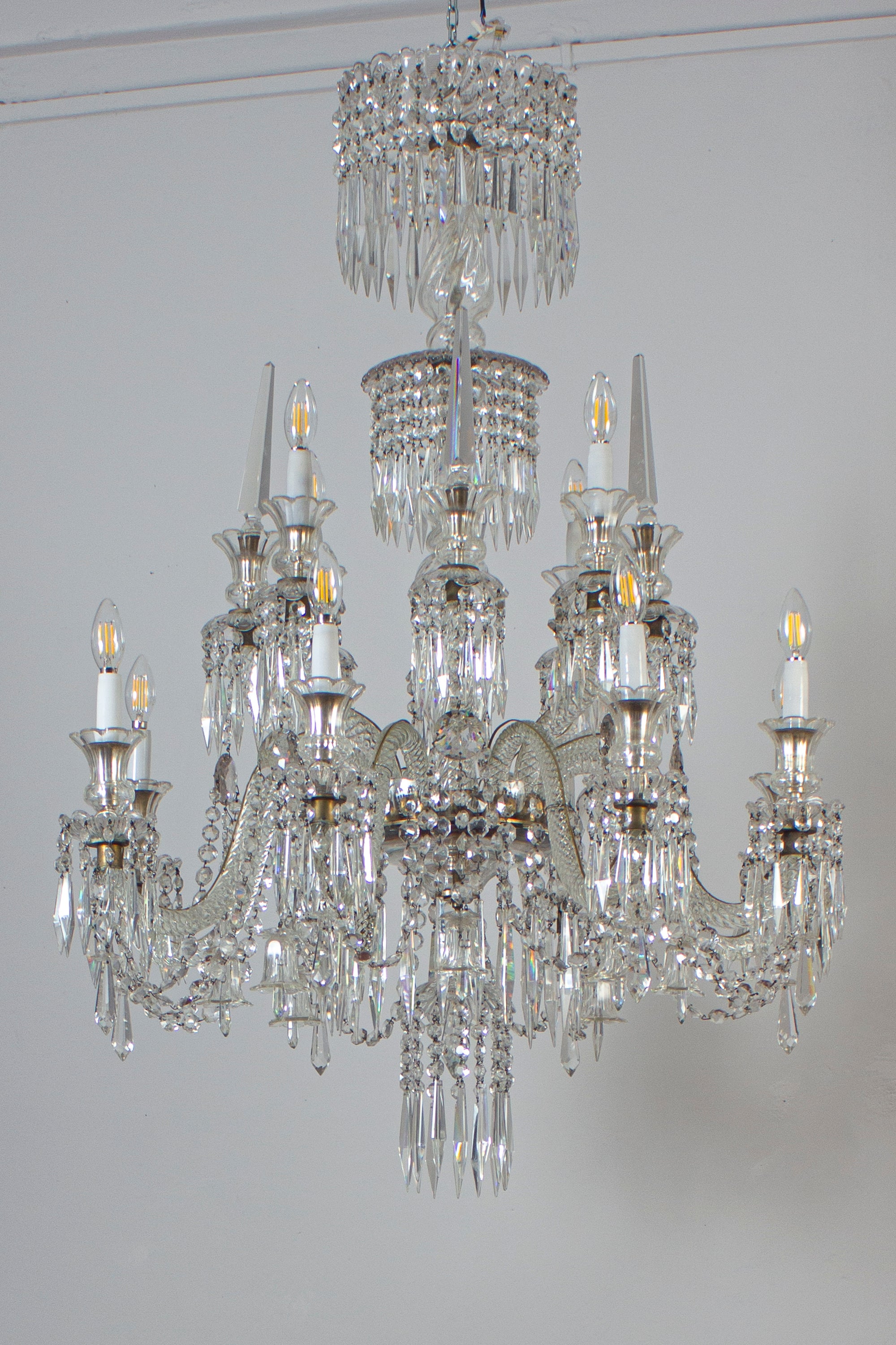 Fabulous French crystal 12 arms  Chandelier attributed to Baccarat .
The frame, made of silver plated brass. Replacing the wax candles, the first processing pattern in 