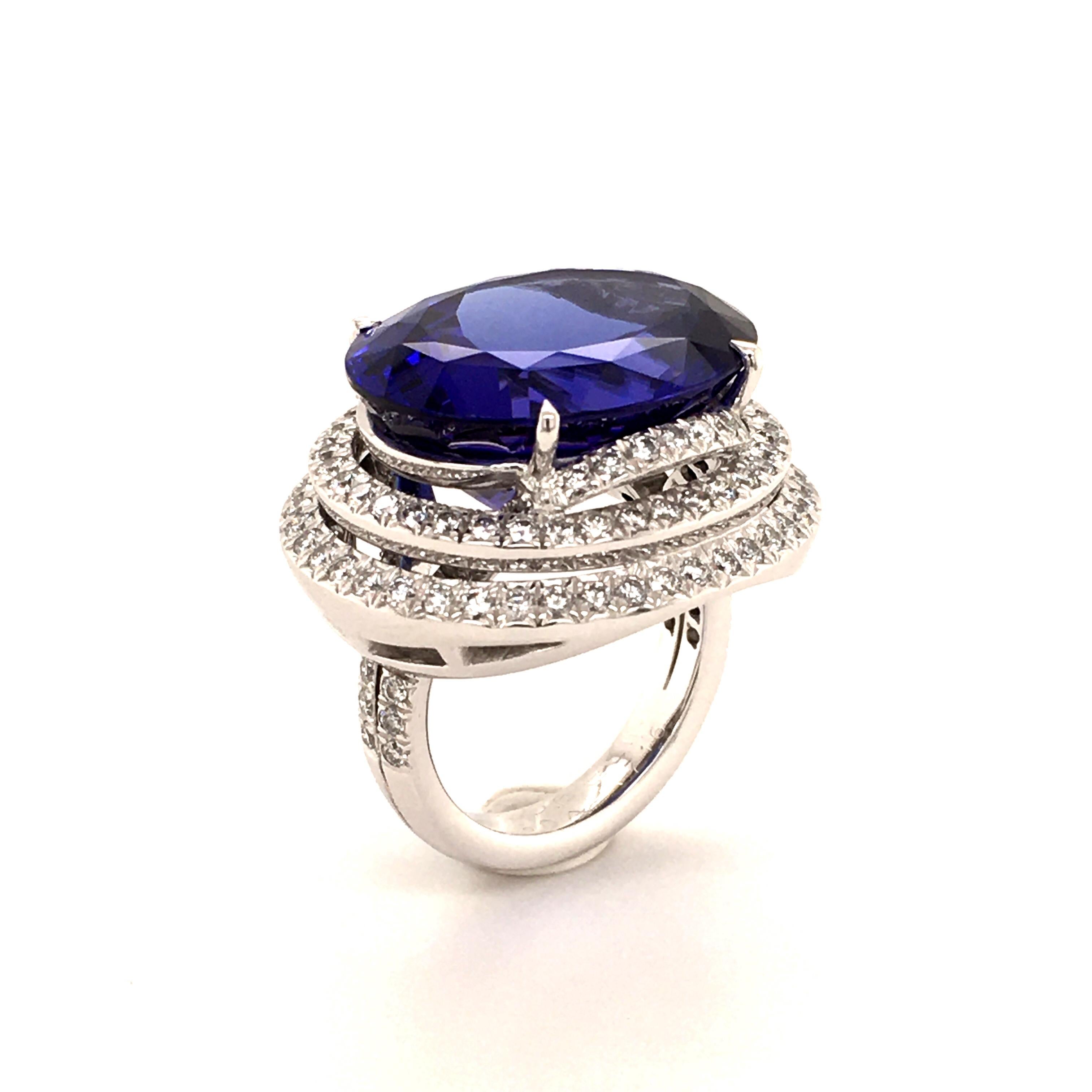 Contemporary Spectacular 23.39 Carat Tanzanite and Diamond Ring in White Gold 18 Karat For Sale