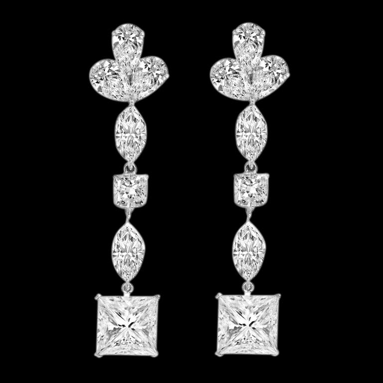 Spectacular 24.32 Carats, all GIA Certified Diamond Earrings. 

These magnificent diamond earrings feature 6 GIA Certified Diamonds.  The Total diamond weight is 24.32 Carats. 

Two Princess Cut Diamonds:

6.74 H SI1 GIA Certified
7.06 H SI1