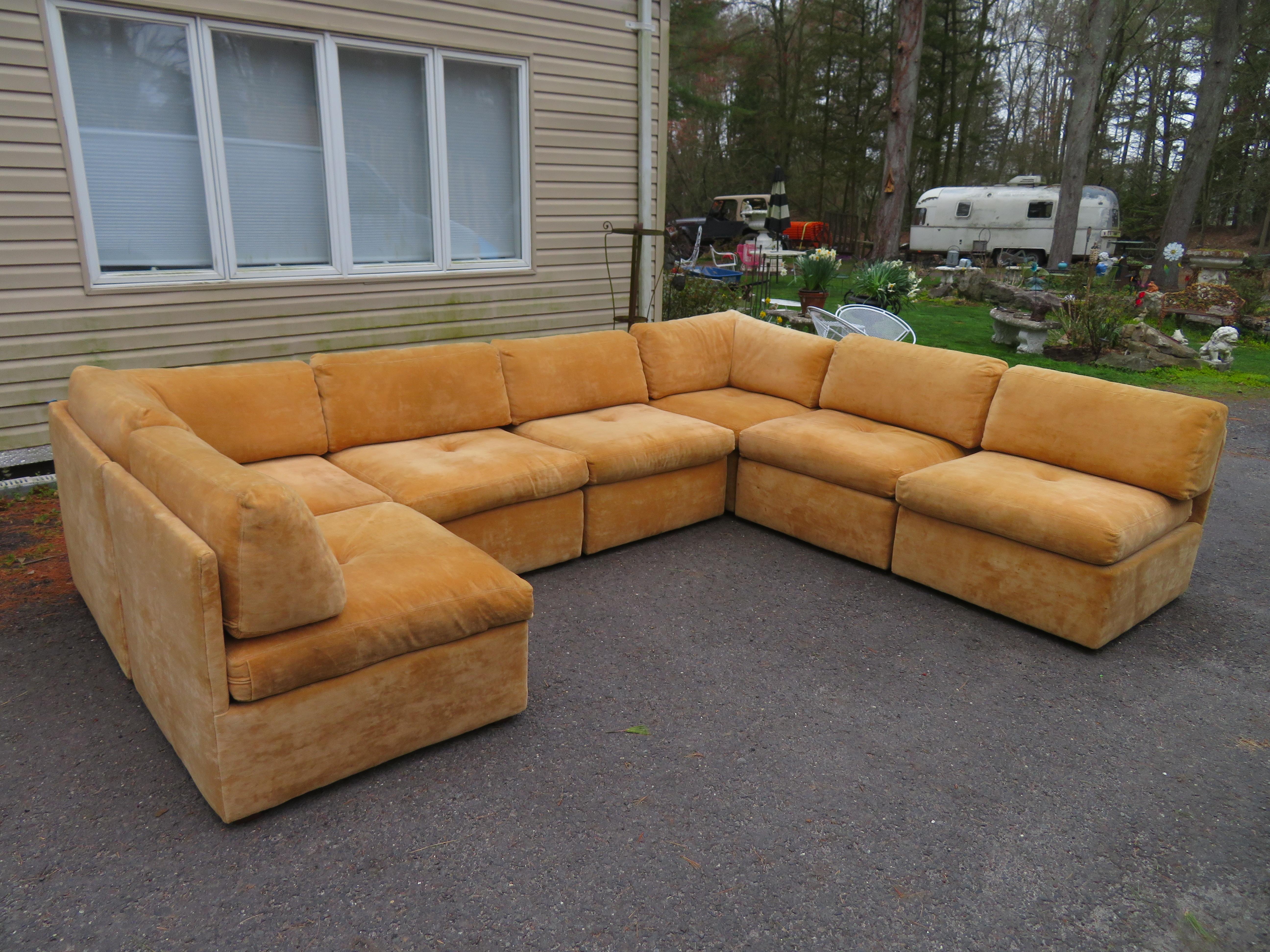 Wonderful 7-piece Milo Baughman style cube sectional sofa. We love this super clean tan velvet sectional in remarkable original condition-shows only minor signs of age. During the mid-century, many furniture companies such as Thayer Coggin and Selig