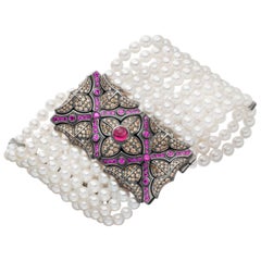 Spectacular 9-Row Pearl Bracelet in White Gold with Diamonds and Pink Sapphire