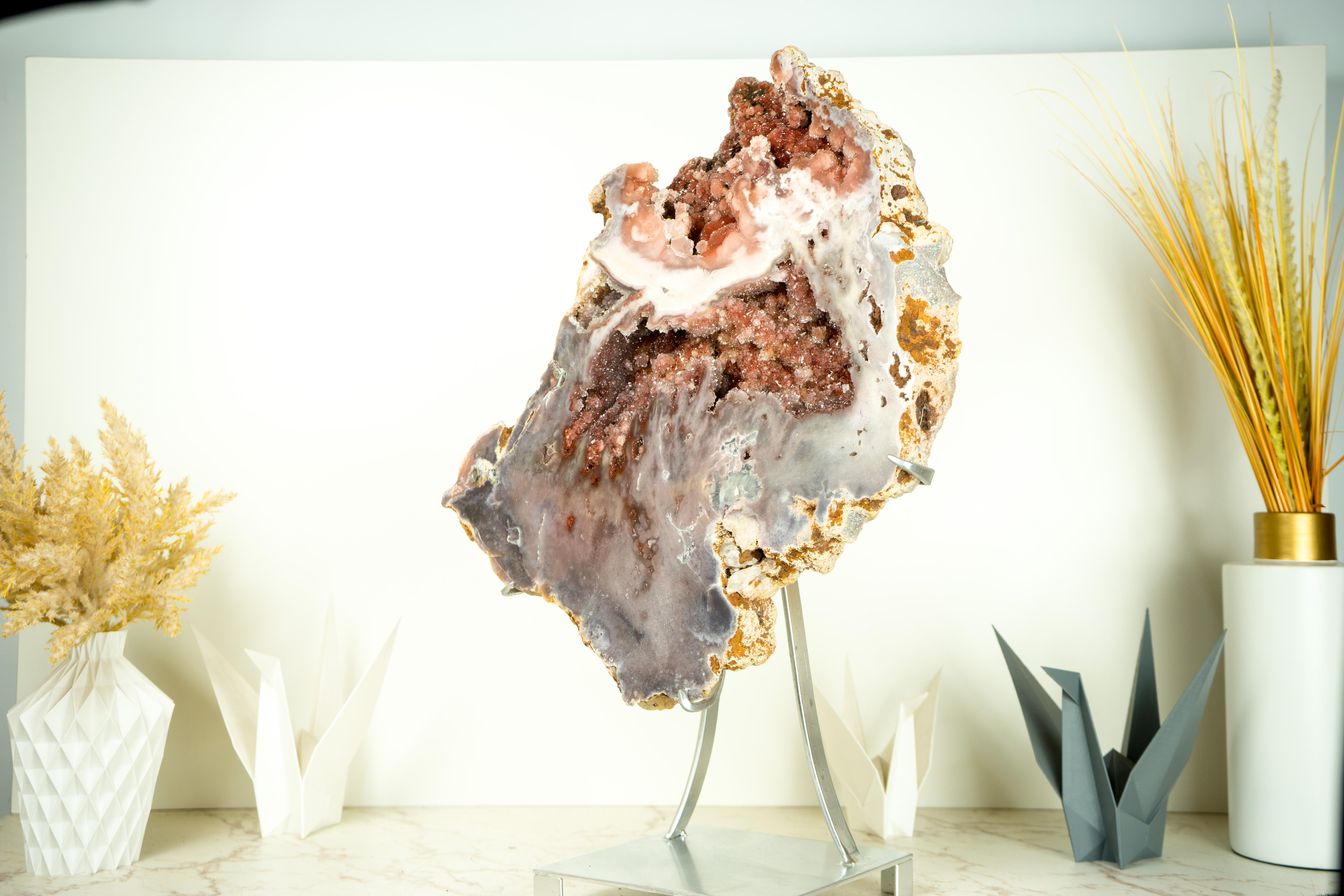 Rare Large Pink Amethyst Geode with Multi Colored Pink and Red Sugar-Druzy and Botroydal Stalactites

▫️ Description

Nature spared no effort when creating this Pink Amethyst geode, a specimen with spectacular aesthetics, showcasing a symphony of