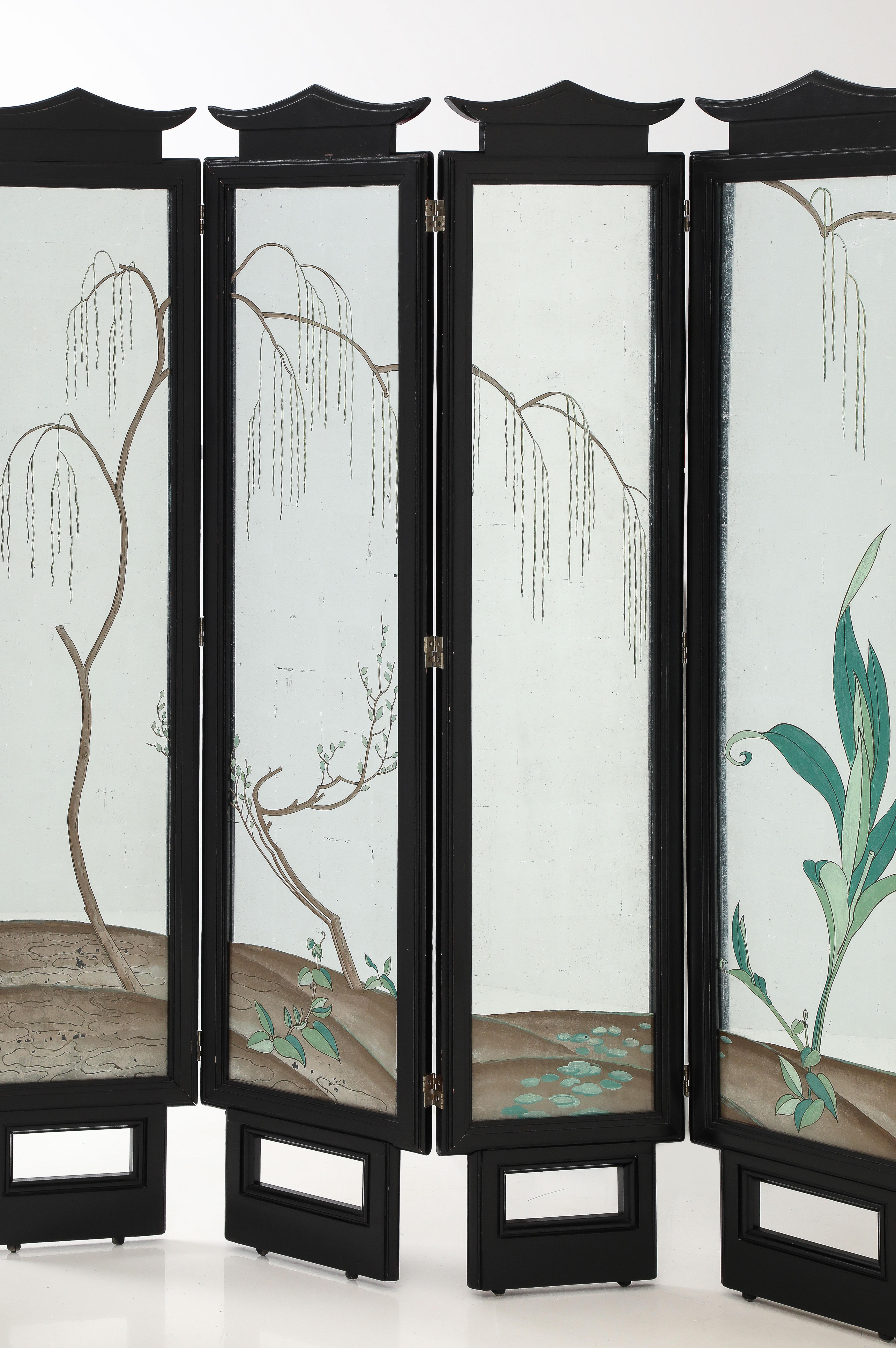 Spectacular and Rare James Mont Folding screen.
The five paneled screen has a reverse painting on silver leafed panels 
that are encased in  black lacquered wooden frames with a pagoda shaped top 
and cut out bottom.
The screen is on little ball