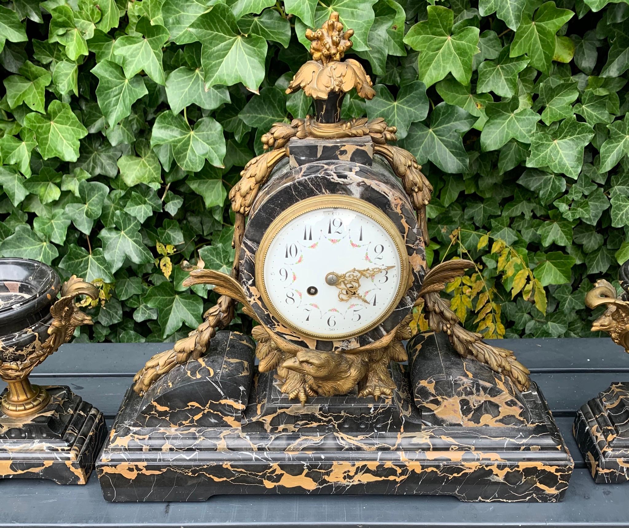 Unique and amazing 19th century mantel clock garniture.

If you are looking for a one of a kind and truly spectacular clock to grace your living space then this work of beauty could soon be displayed on your mantel or sidetable. You will rarely see
