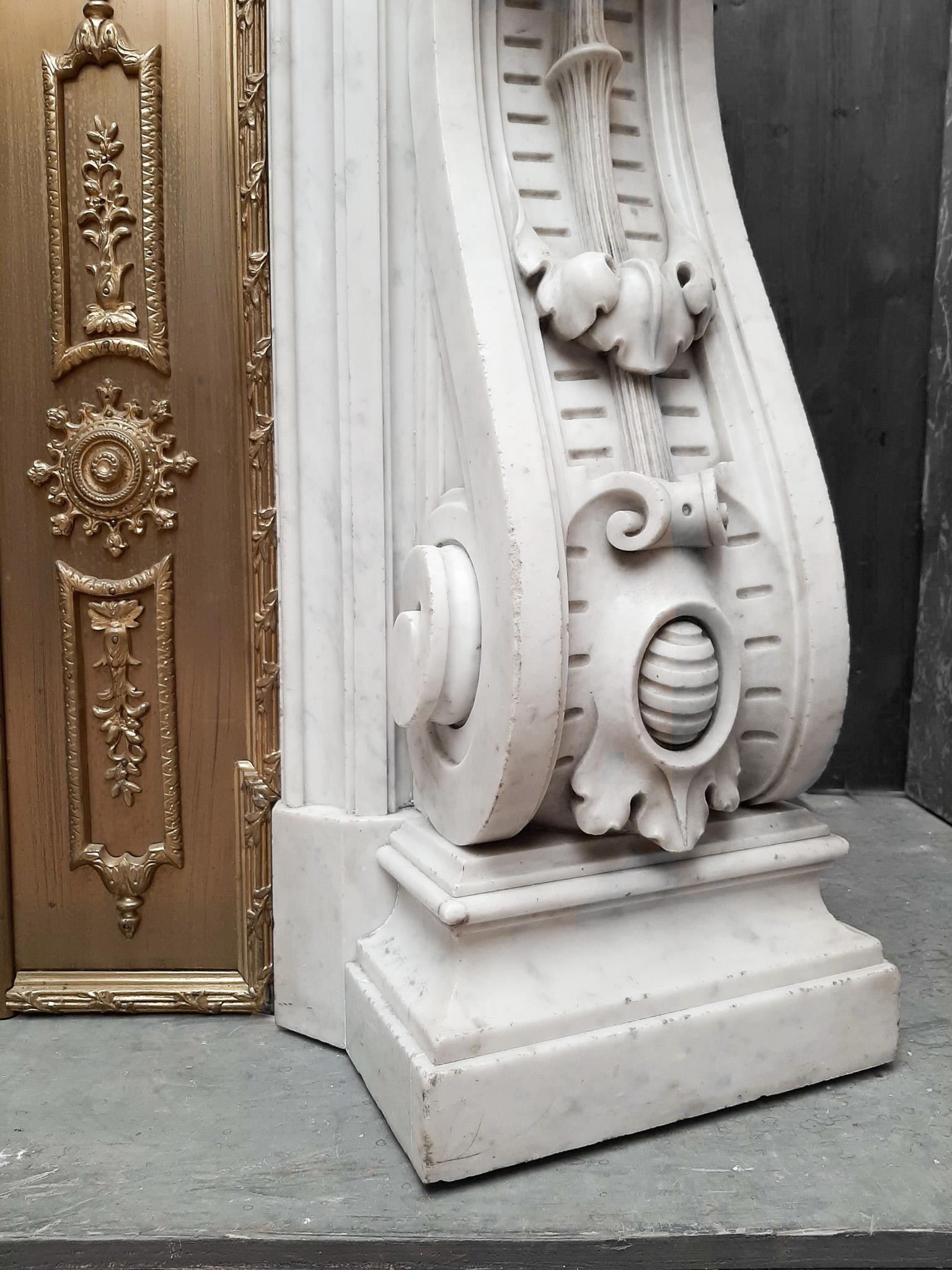 Spectacular Antique Carved French Marble Fireplace with Original Brass Insert In Good Condition For Sale In Baambrugge, NL