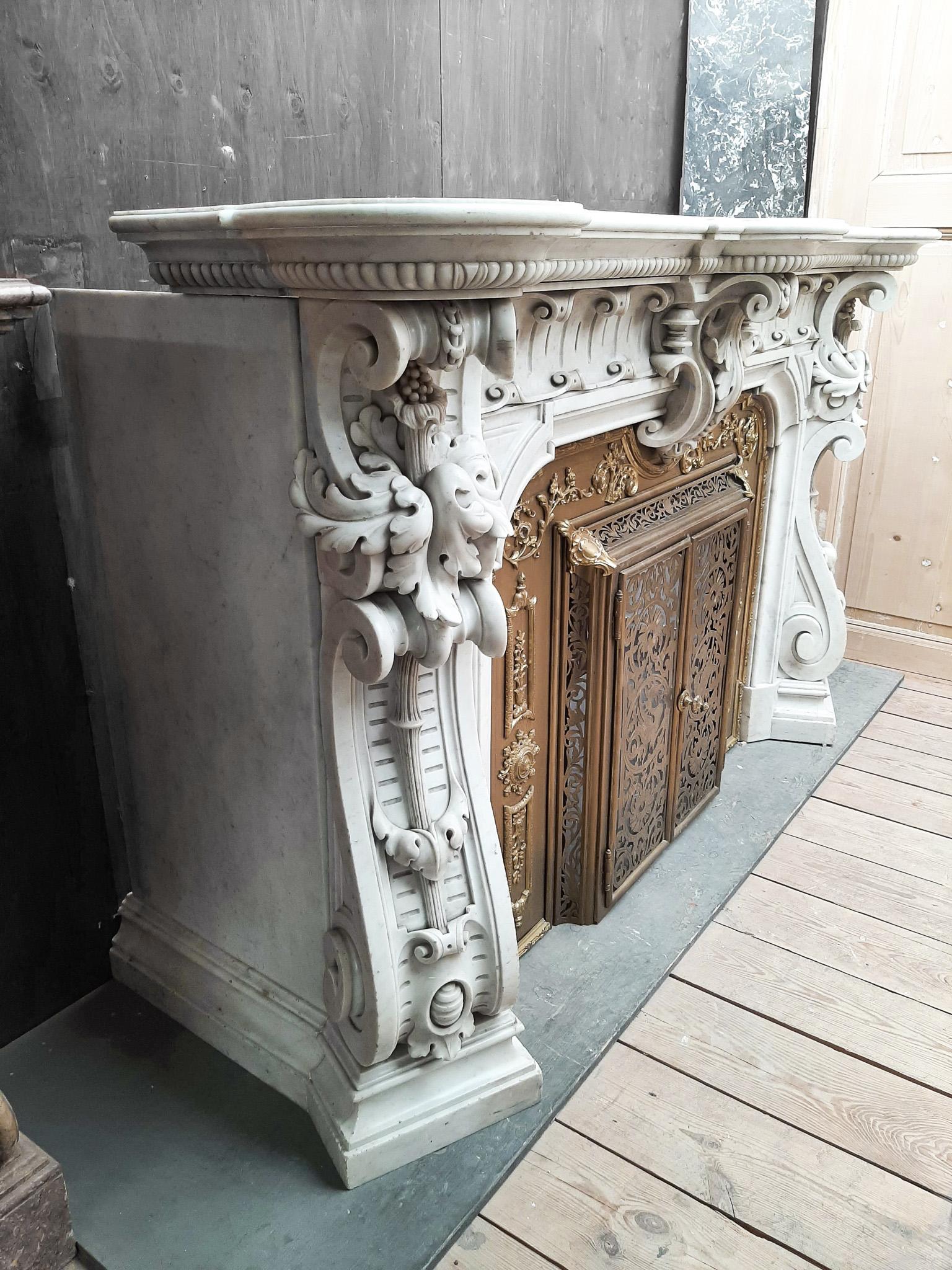Spectacular Antique Carved French Marble Fireplace with Original Brass Insert For Sale 1