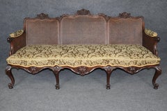 Spectacular Carved Mahogany Cane and Damask Upholstered English Georgian Sofa