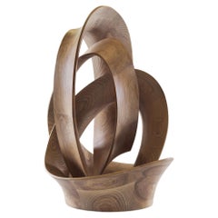 Contemporary 'knotted' sculpture in natural or ebonized ash by master maker