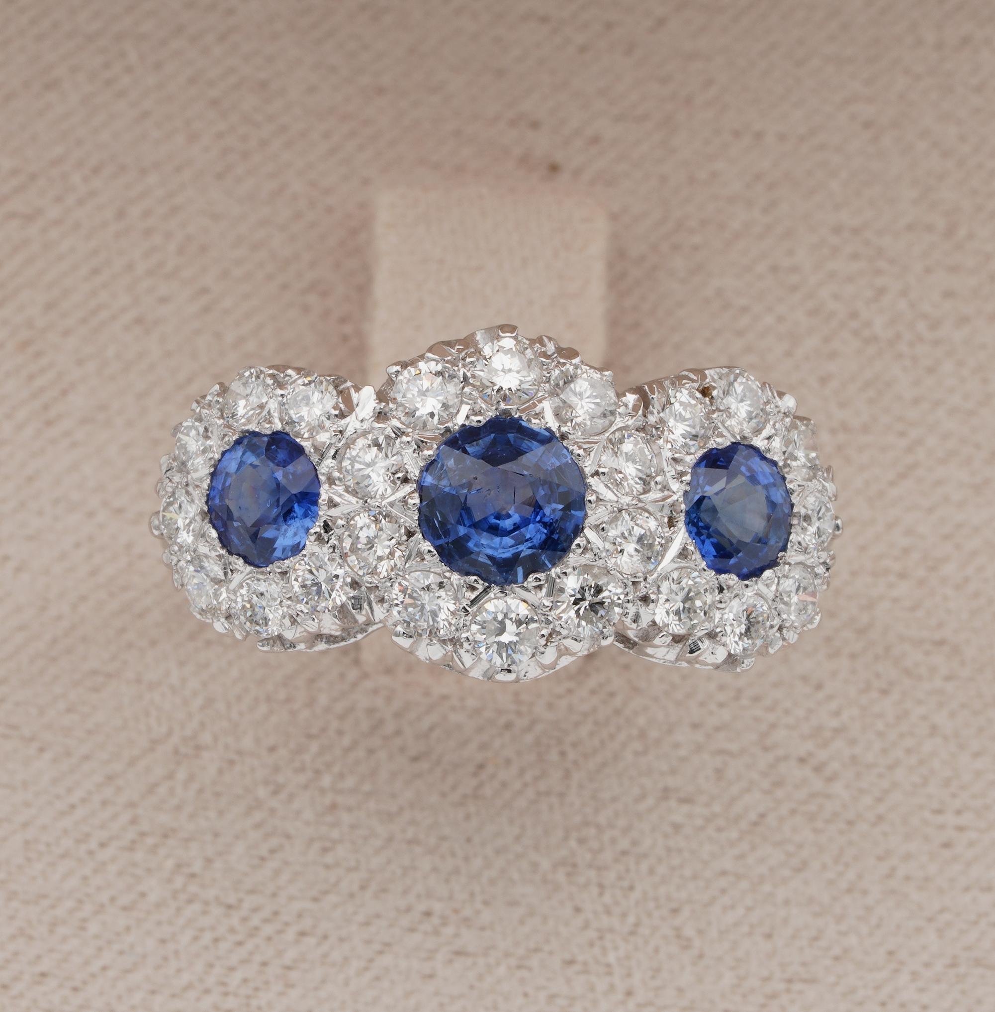 Blue Romance!

Sapphires recently verified as no heated 

Charming trilogy version of Blue and White daisies formed by dazzling Diamonds and Blue hearts
Skilfully hand crafted of solid 18 Kt white gold this 1940 ring oozes of charm
The centre piece