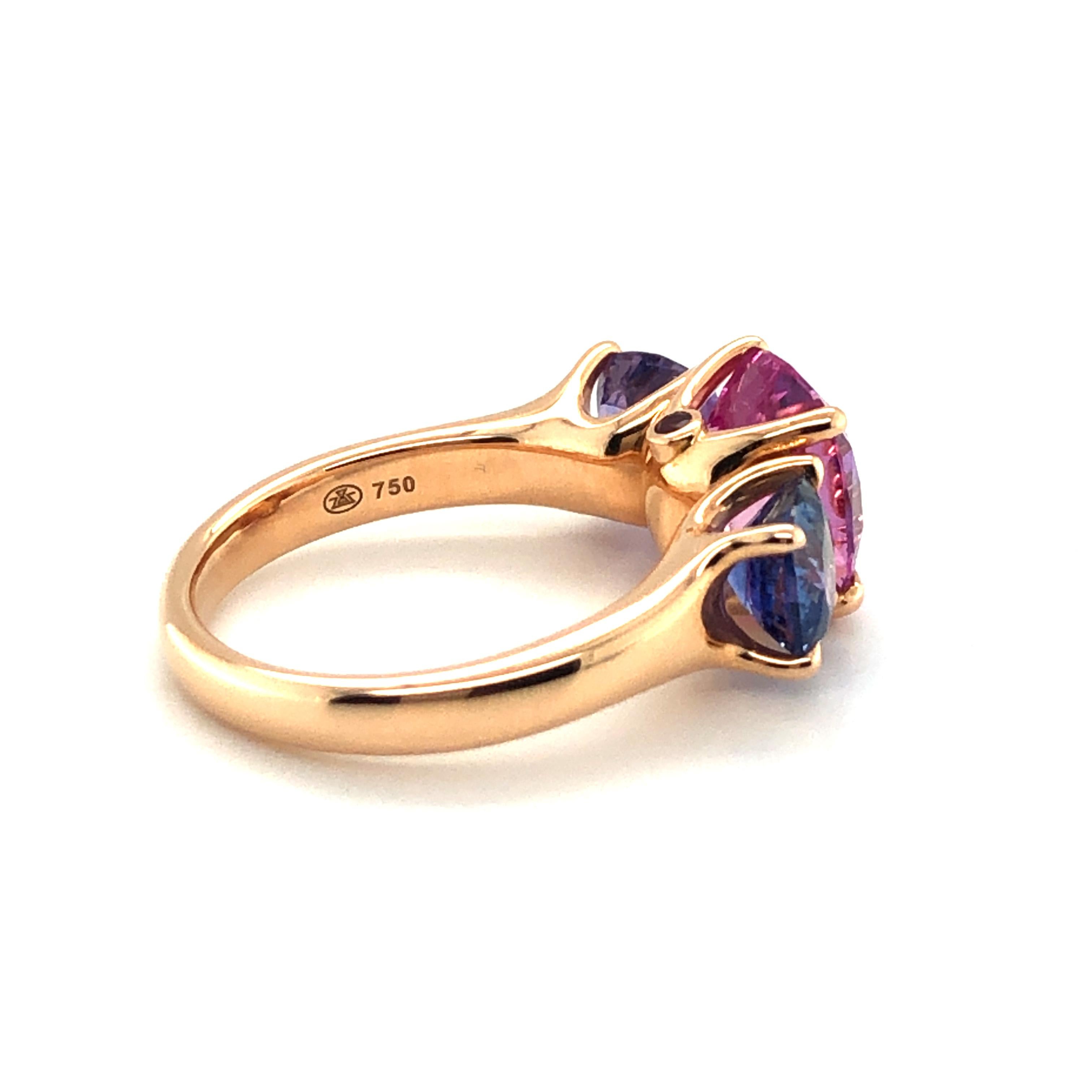 Women's or Men's Spectacular Fancy Sapphire Trilogy Ring by Gübelin in 18 Karat Rose Gold For Sale
