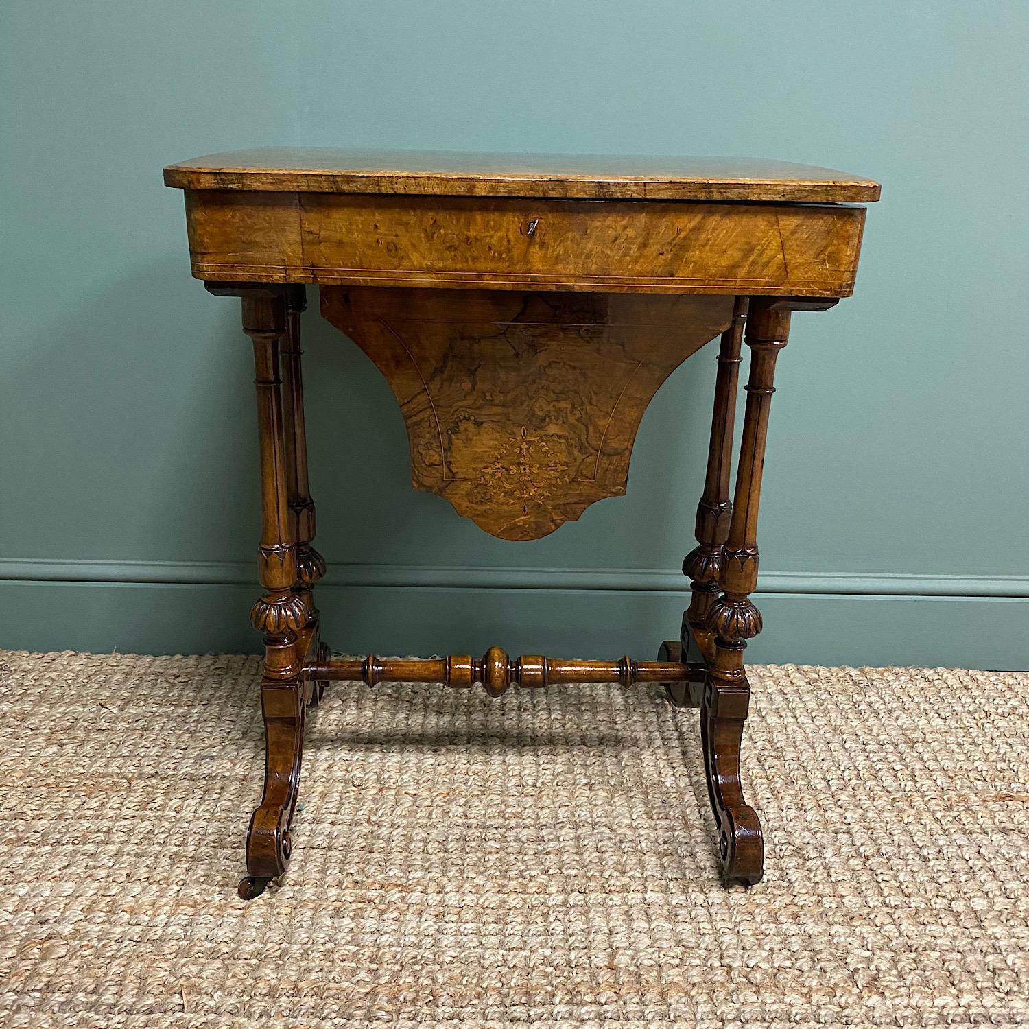 Spectacular Figured Walnut Inlaid Victorian Antique Work Box / Side Table

This Spectacular 19th Century Figured Walnut Inlaid Victorian Antique Work Box / Side Table dates from ca. 1870.  The top is beautifully figured with fine inlay and opens to