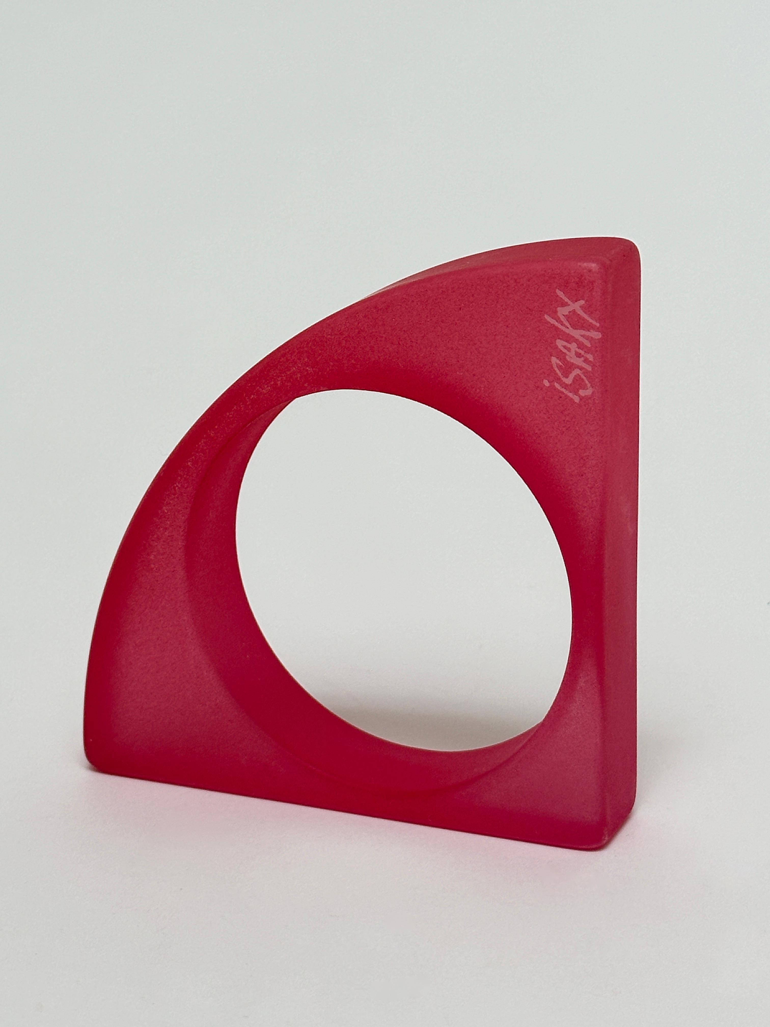 Half object, half jewel, this sculptural bangle in sandblasted resin bears the handwritten signature of the artist.

Measurements (cm) :
triangle's sides 9.8 
depth 2 
wrist (int. diam.) 6.5

Former engineer, Isaky settles his reputation as a jewel
