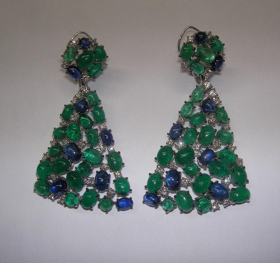 Earrings White Gold 18 K Gianni Lazzaro 

Diamonds 52-1,60 ct GVS
Emerald 46-34,69ct.,
Saphire 60-14,94ct.
Weight 39,60 grams

With a heritage of ancient fine Swiss jewelry traditions, NATKINA is a Geneva based jewellery brand, which creates modern