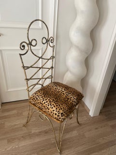 Spettacolare sedia con schienale alto in ferro battuto dorato di René Drouet, Francia 1945.