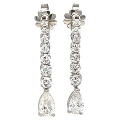 Spectacular Graduated Drop Earrings in Platinum