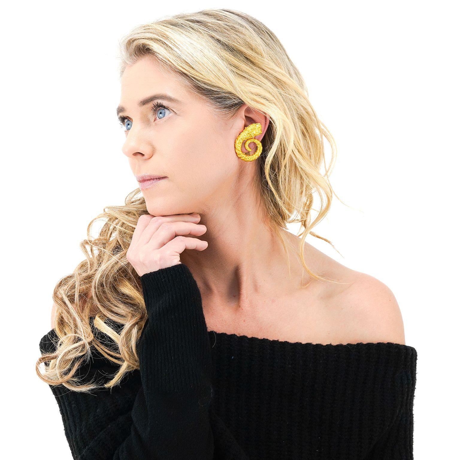 Circa 1960s, 22k, by Ilias Lalaounis, Greece.  The Mycenaean lion's head motif is central to Lalaounis' archeological taste designs. These 22k gold earrings are particularly large and well-made examples.  Excellent condition. 

Remark: “These