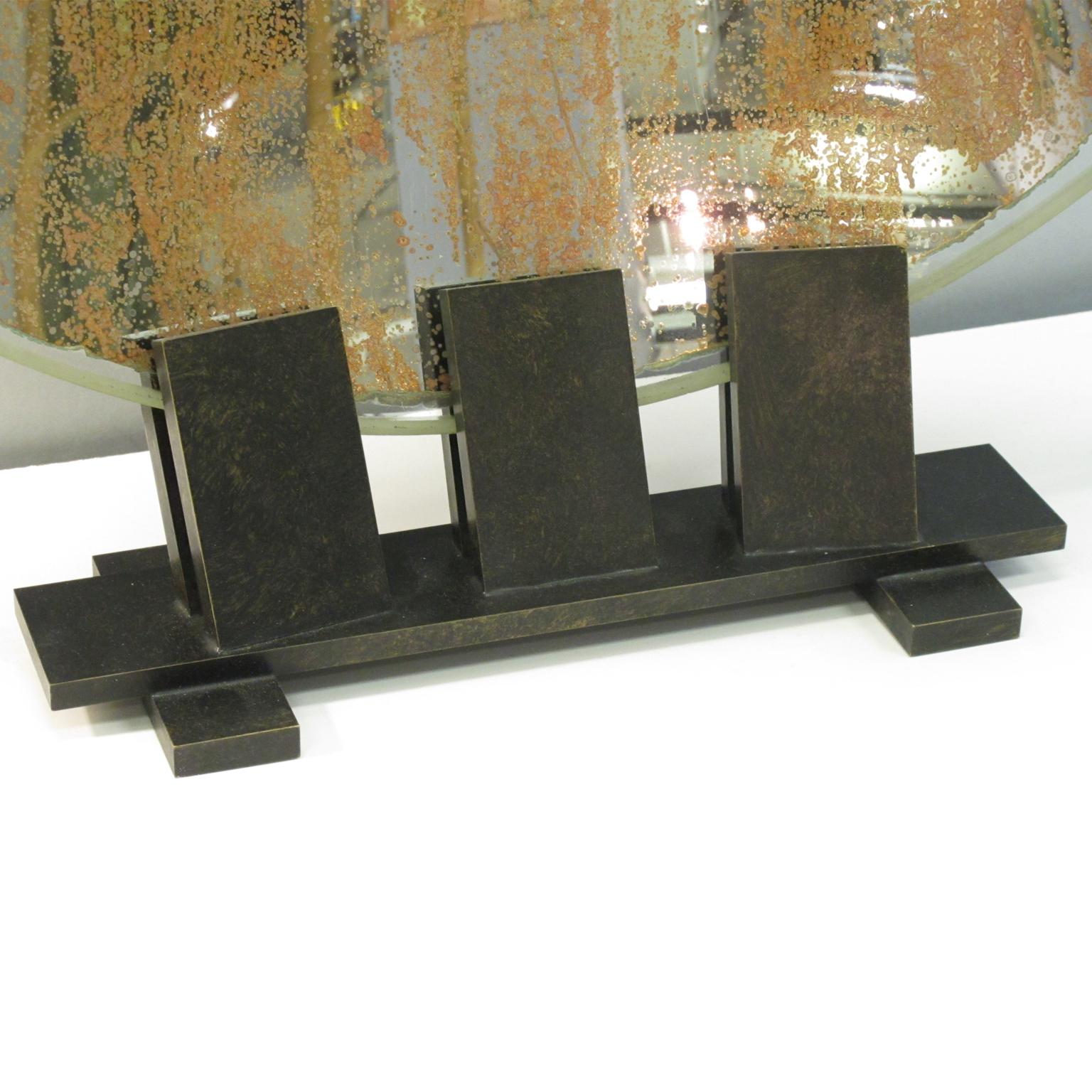 Rare large lighthouse mirrored optic lens sculpture mounted on a custom-made pedestal. Huge Industrial concave mirror used in a lighthouse in France in the early 20th Century. Solid brass with aged patina custom-made base. This interesting piece