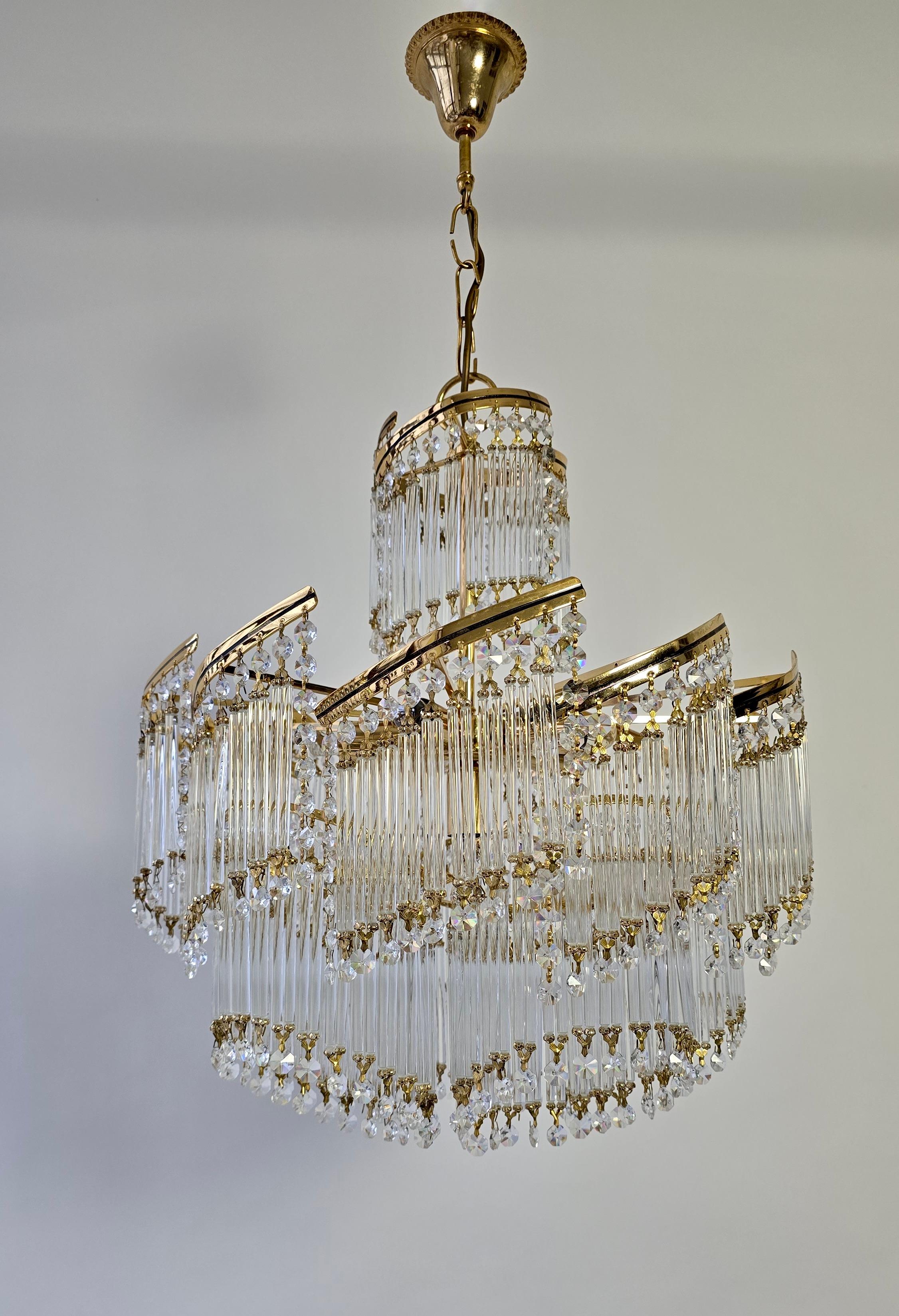 Hollywood Regency Spectacular Italian Chandelier – Undulating Elegance in Glass and Brass, 1970s For Sale