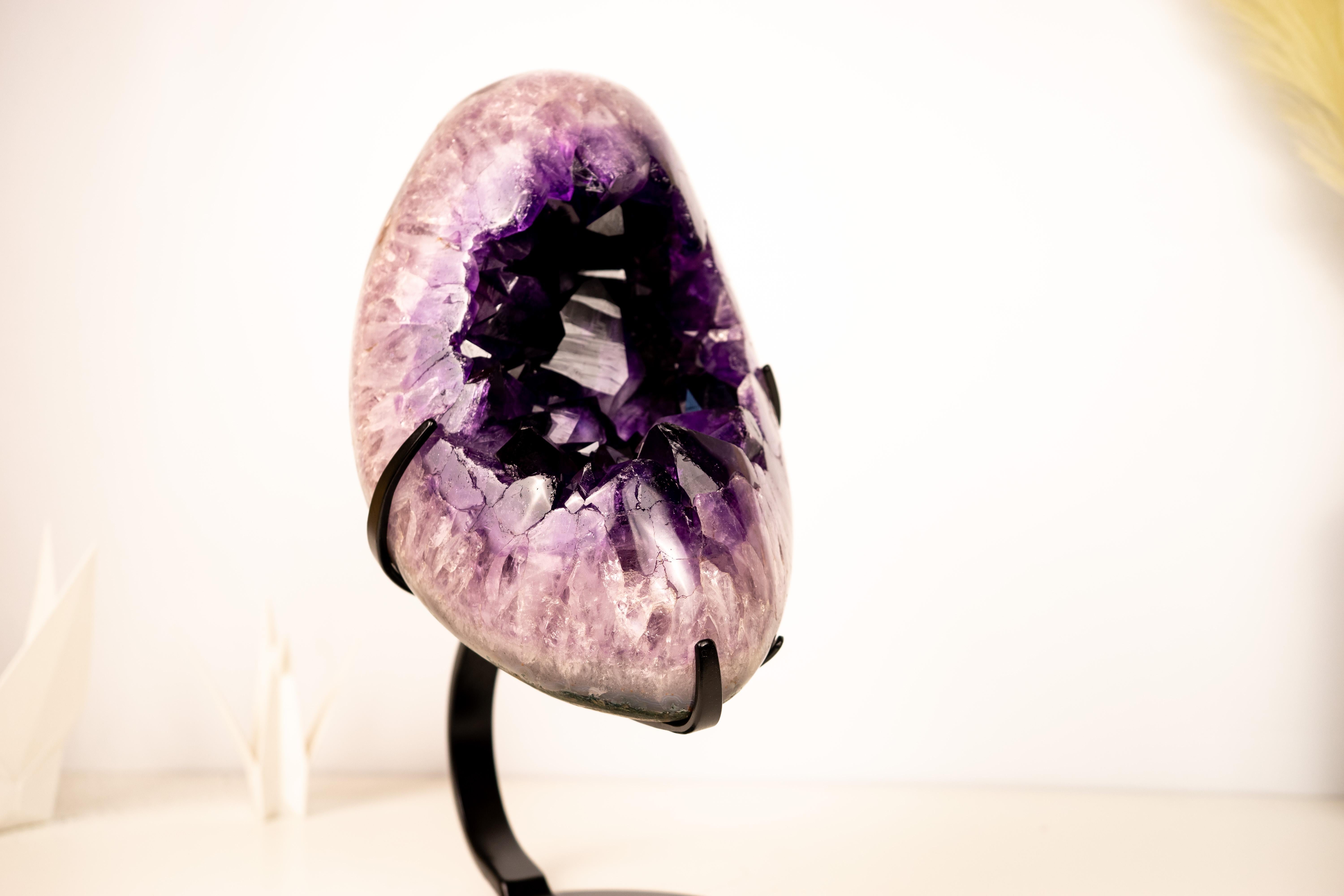 Rare Carved Amethyst Half-Moon with Large, Intact Purple Crystals

▫️ Description

This exquisite Large Amethyst Half-Moon is a rare and extraordinary specimen showcasing the finest deep-purple amethyst crystals. With beautifully large points,
