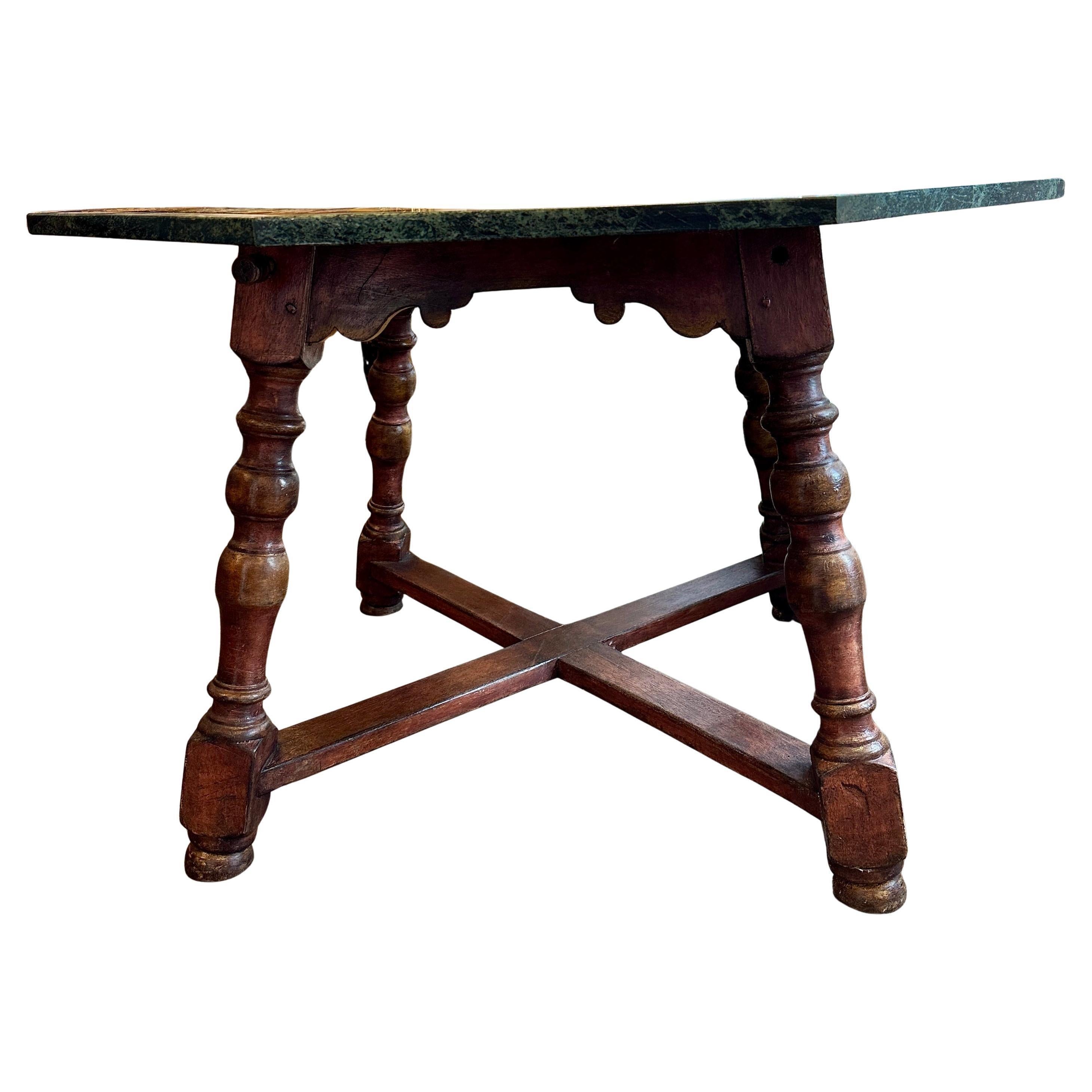 Octagonal, circa 1930 Tuscan, specimen marble table atop a stained, turned-leg base with X-stretcher.