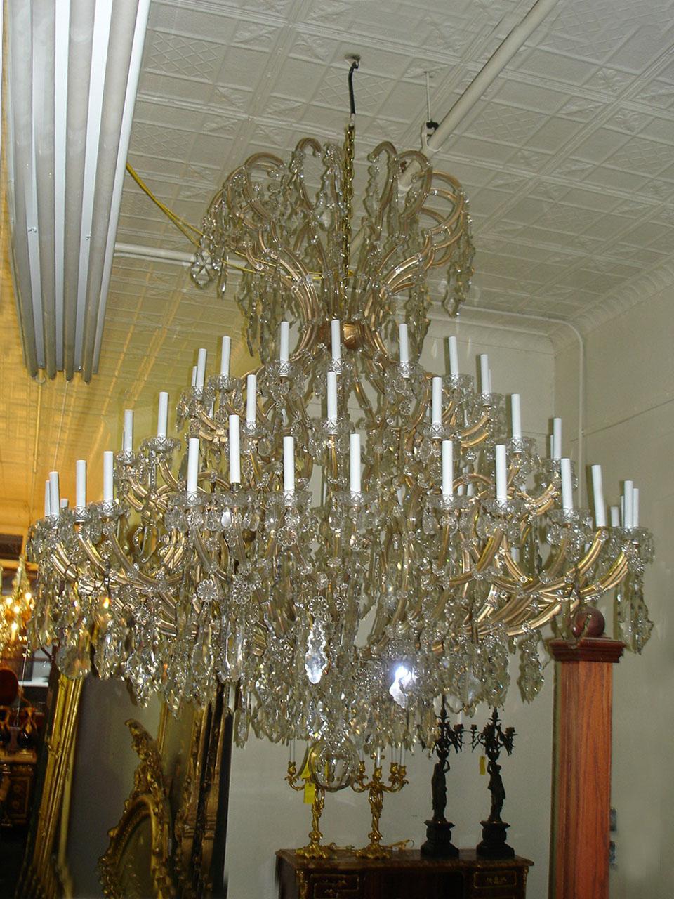 This listing is a second and final payment for this item. Total price of the item $64,596. Half already paid, this is the second half. 

An spectacular late 19th-early 20th century 64-light Maria Theresa style chandelier

Formally hung in the