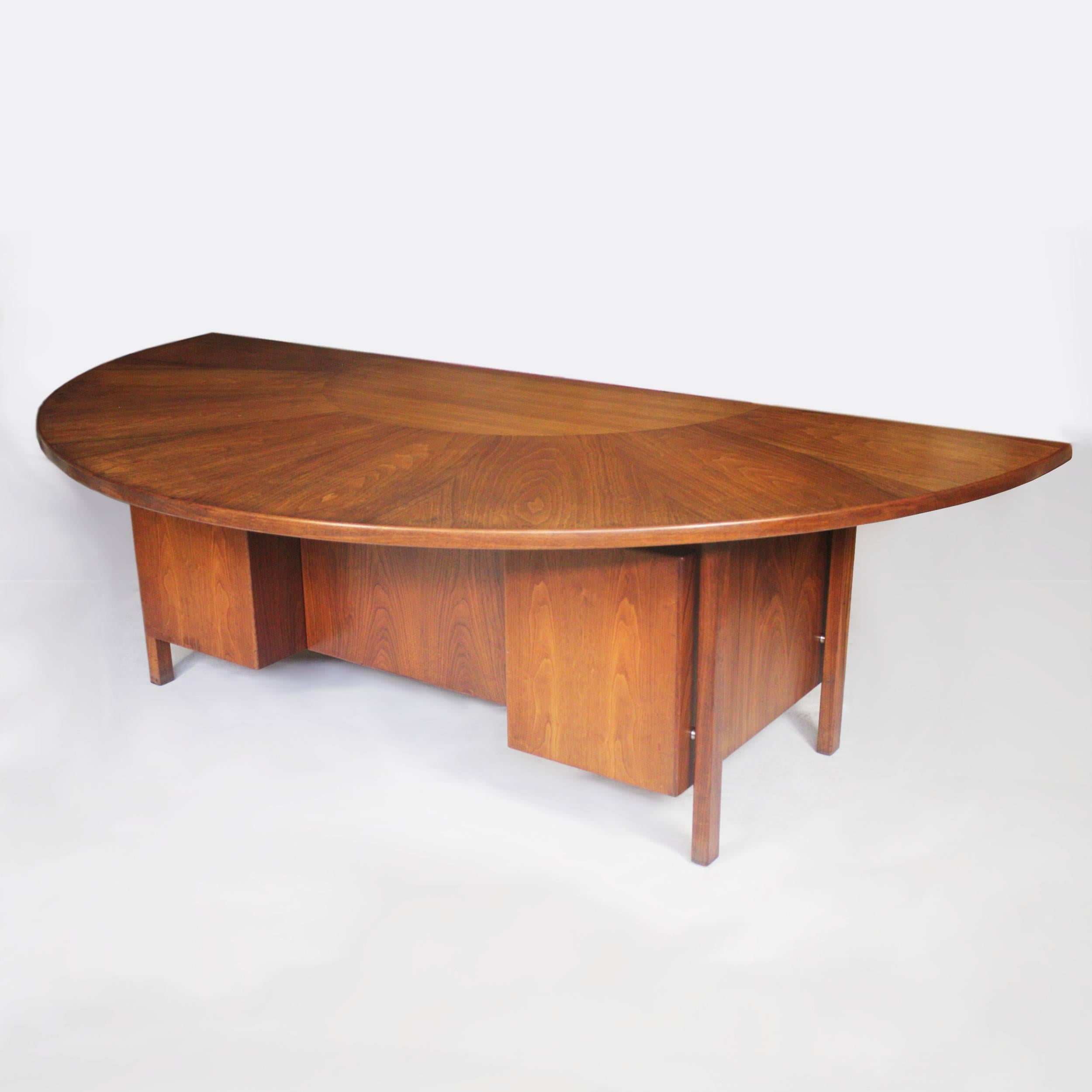 This spectacular Mid-Century Modern executive desk was manufactured by the B.L. Marble and is highly influenced by Jens Risom designs of the time. Desk features a gorgeous walnut base with unique floating legs and brushed aluminum hardware. However,