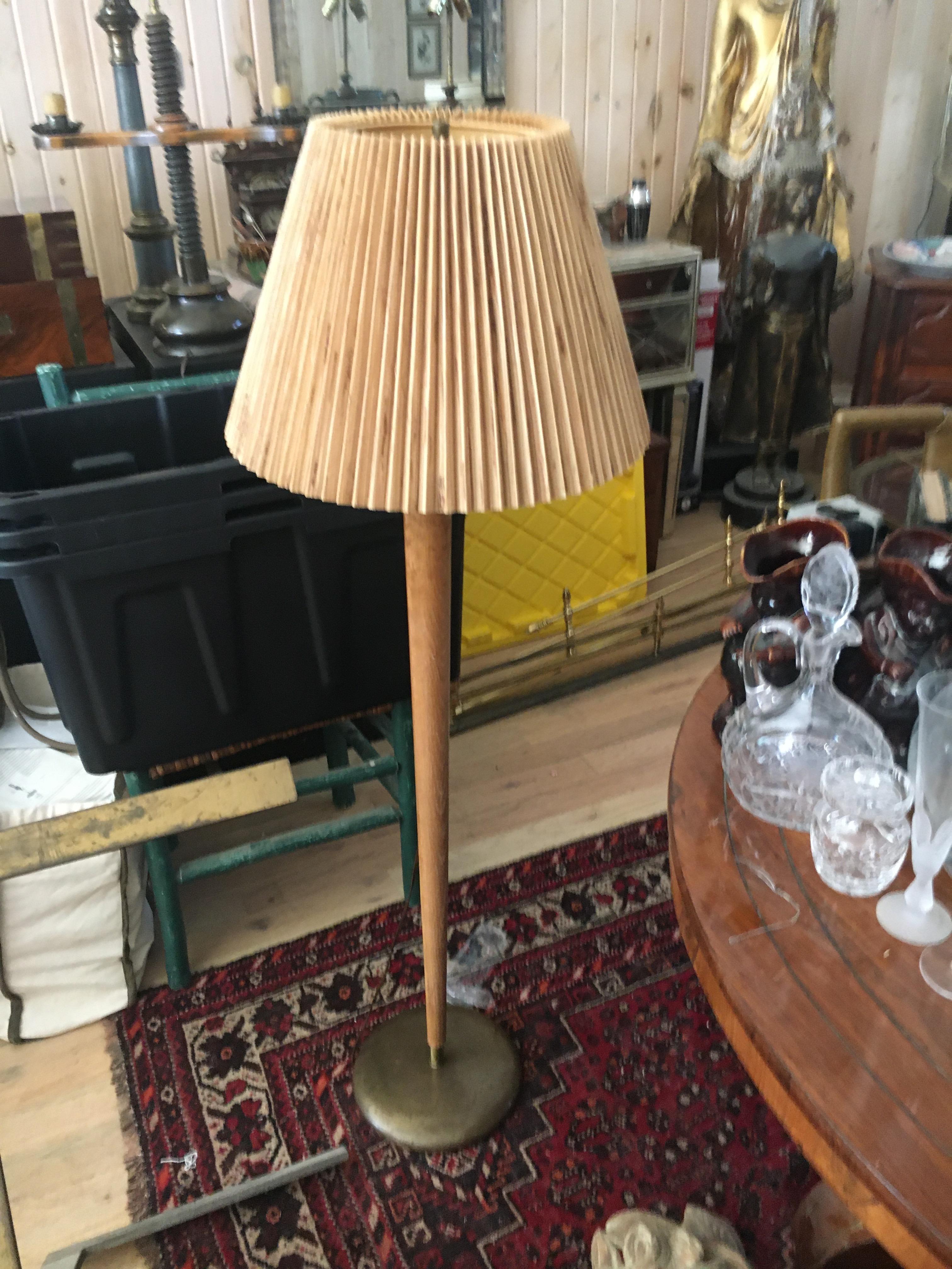 Spectacular midcentury teak and brass floor lamp, nice clean lines and patina. Needs to be rewired, have a shade but probably needs to be replaced. 54