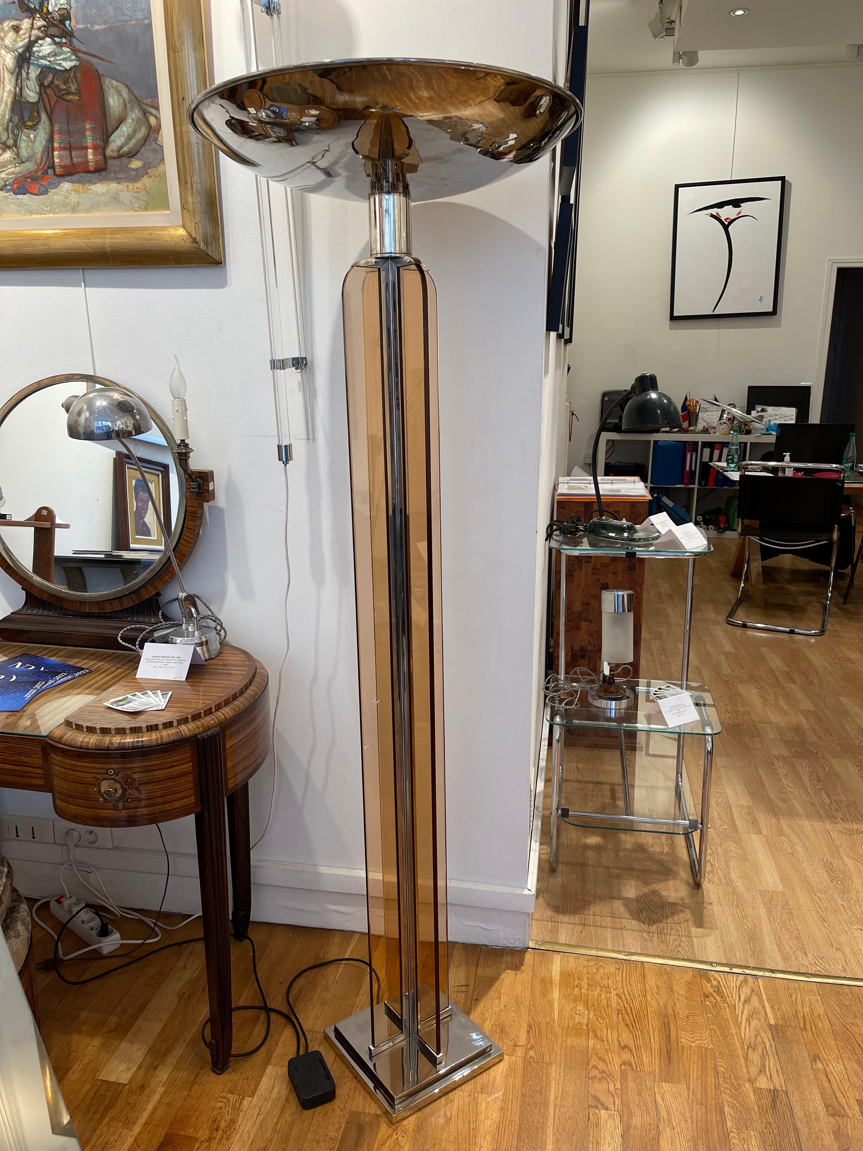 Spectacular floor lamp in the style of Jacques Adnet. Art Deco, France, 1930's. 
Modernist lamppost with nickel plated metal frame enclosing four amber glass slides. Important hemispheric bowl and quadrangular base.
Dimensions: bowl diameter: 60cm,
