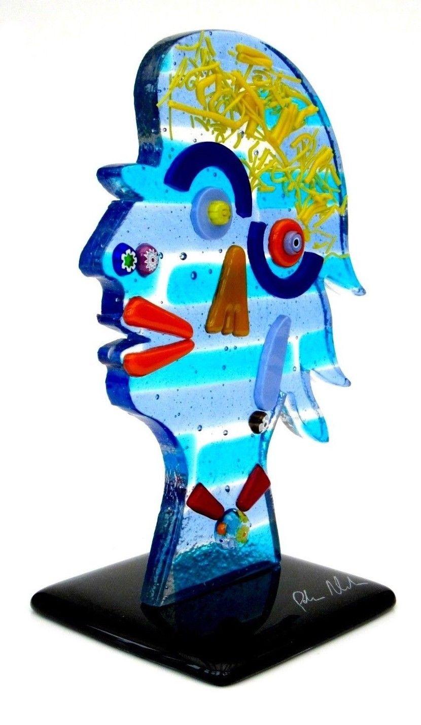Fabulous Murano art glass face sculpture made in celebration to Picasso. The handcrafted multicolored sculpture is signed by the artist and includes a certificate. The colors can appear to be more intense in different light conditions and angles.