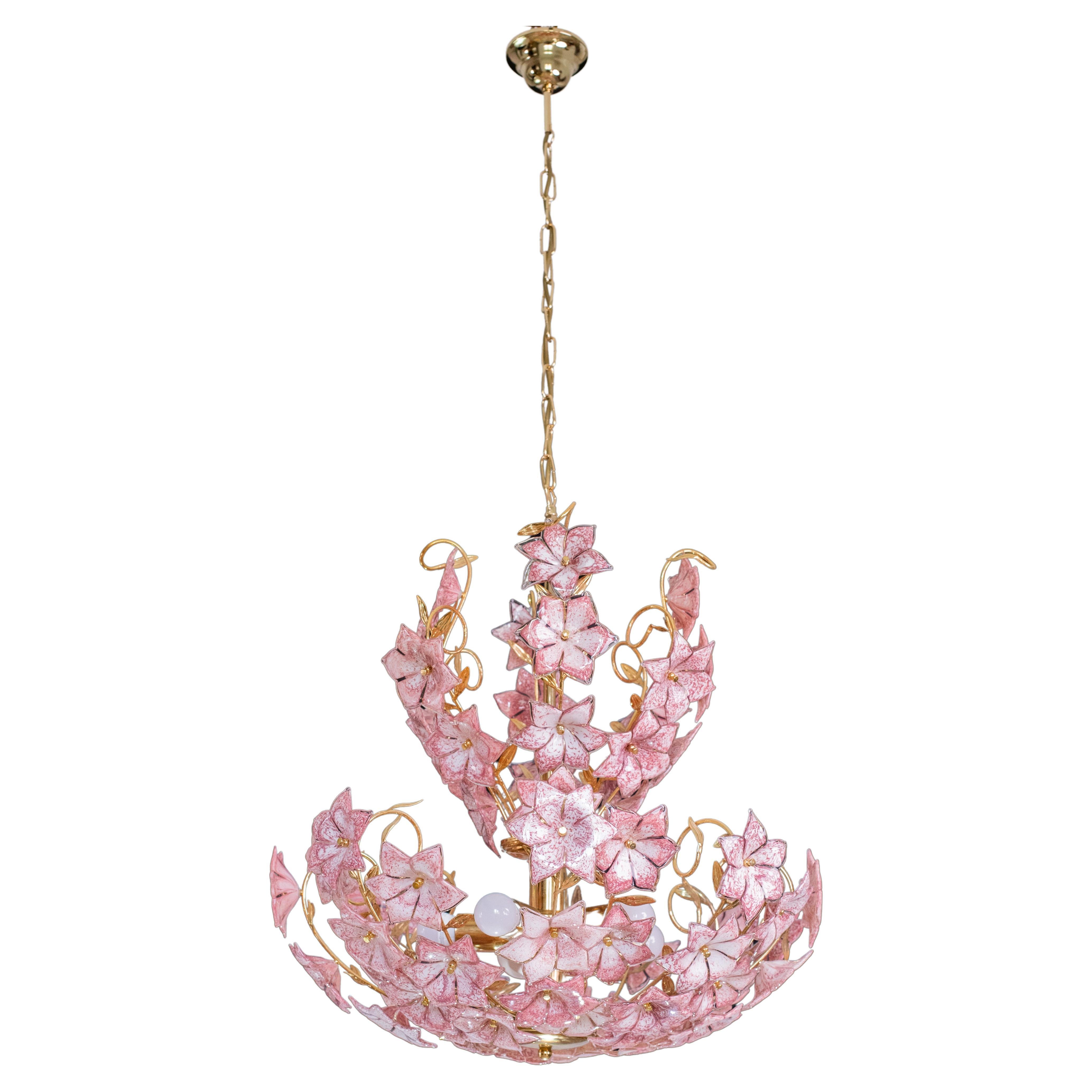 Spectacular Vintage Murano glass chandelier full of pink flowers.
The chandelier has 5 light points with E27 connection.
The structure is in gold bath, good vintage condition.
The height of the chandelier is 130 cm, the diameter is 80, on request