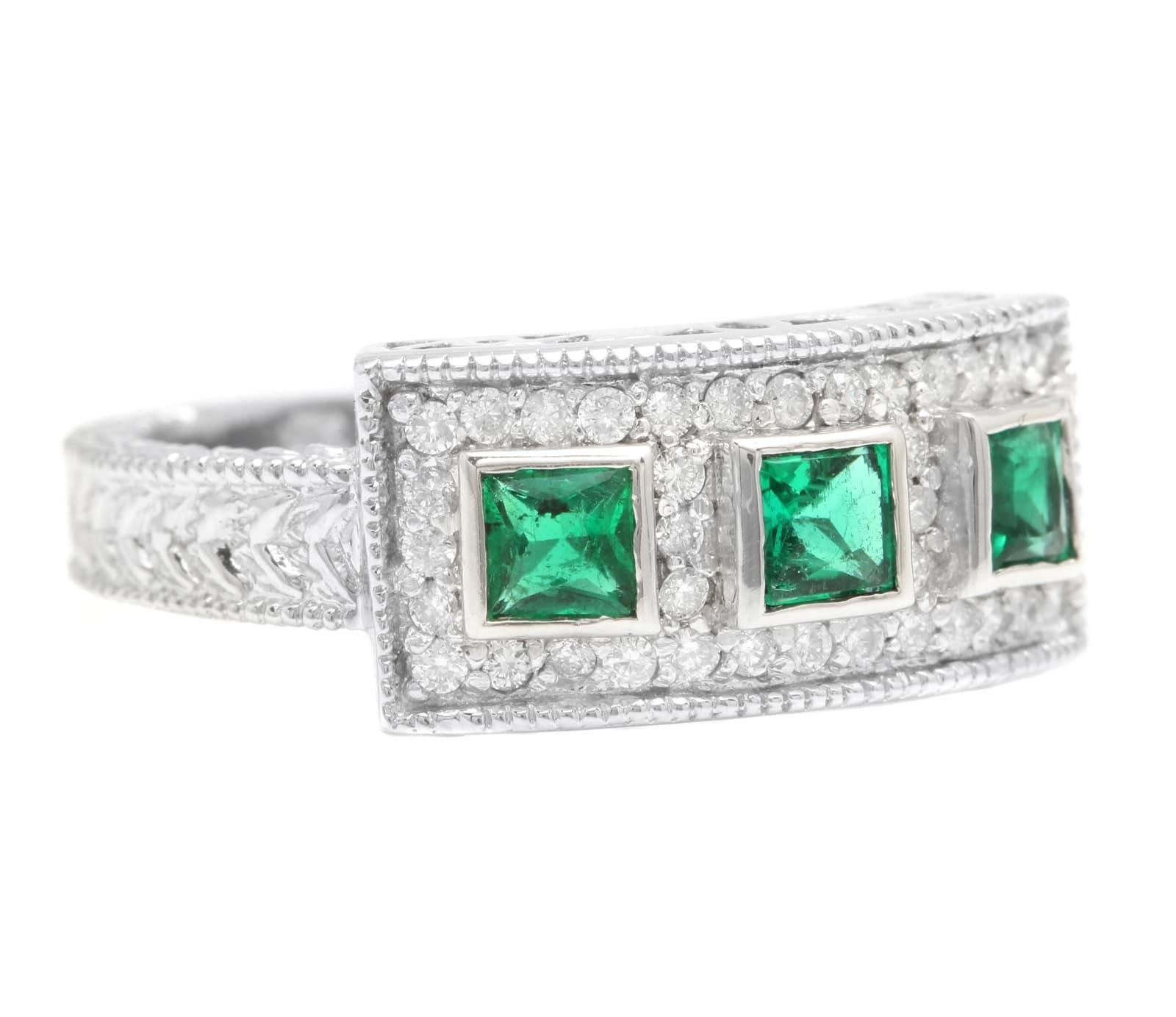0.75 Carats Natural Emerald and Diamond 14K Solid White Gold Ring

Suggested Replacement Value: $5,500.00

Total Natural Green Emeralds Weight is: Approx. 0.50 Carats (High Quality) 

Emerald Measures: Approx. 4.00mm x 4.00mm

Natural Round Diamonds