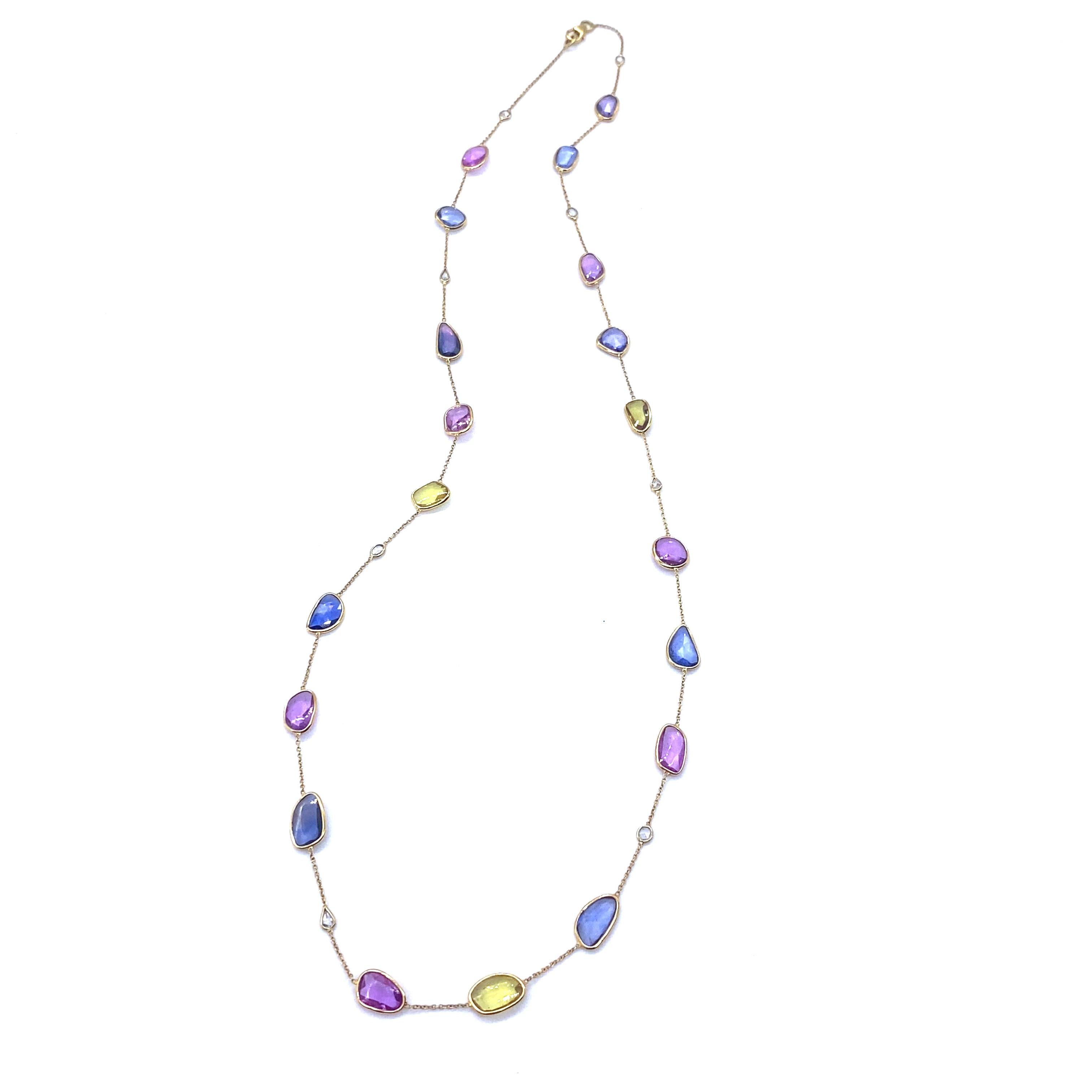 Trinity Necklace Set in 18 Karat White Gold with 28.45 Carat Rose-Cut Sapphire and 0.50 Carat Rose-Cut Diamonds. The Sapphires Exhibit A Vibrant Array of Hues, From Brilliant Yellow and Vivid Violet to Bold Blue and Pale Pink.