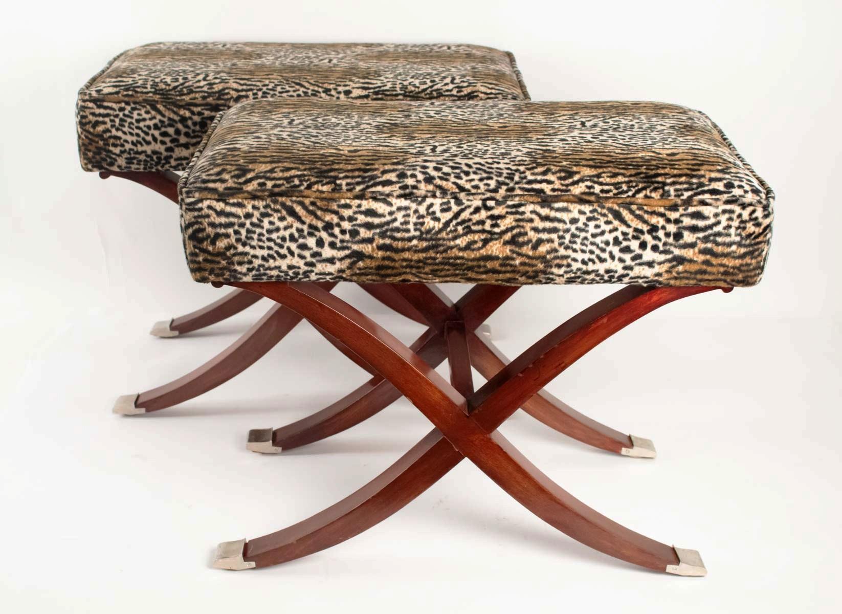 Spectacular pair of Art Deco style X-shaped stools, France, late 20th century
with fake leopard upholstery.