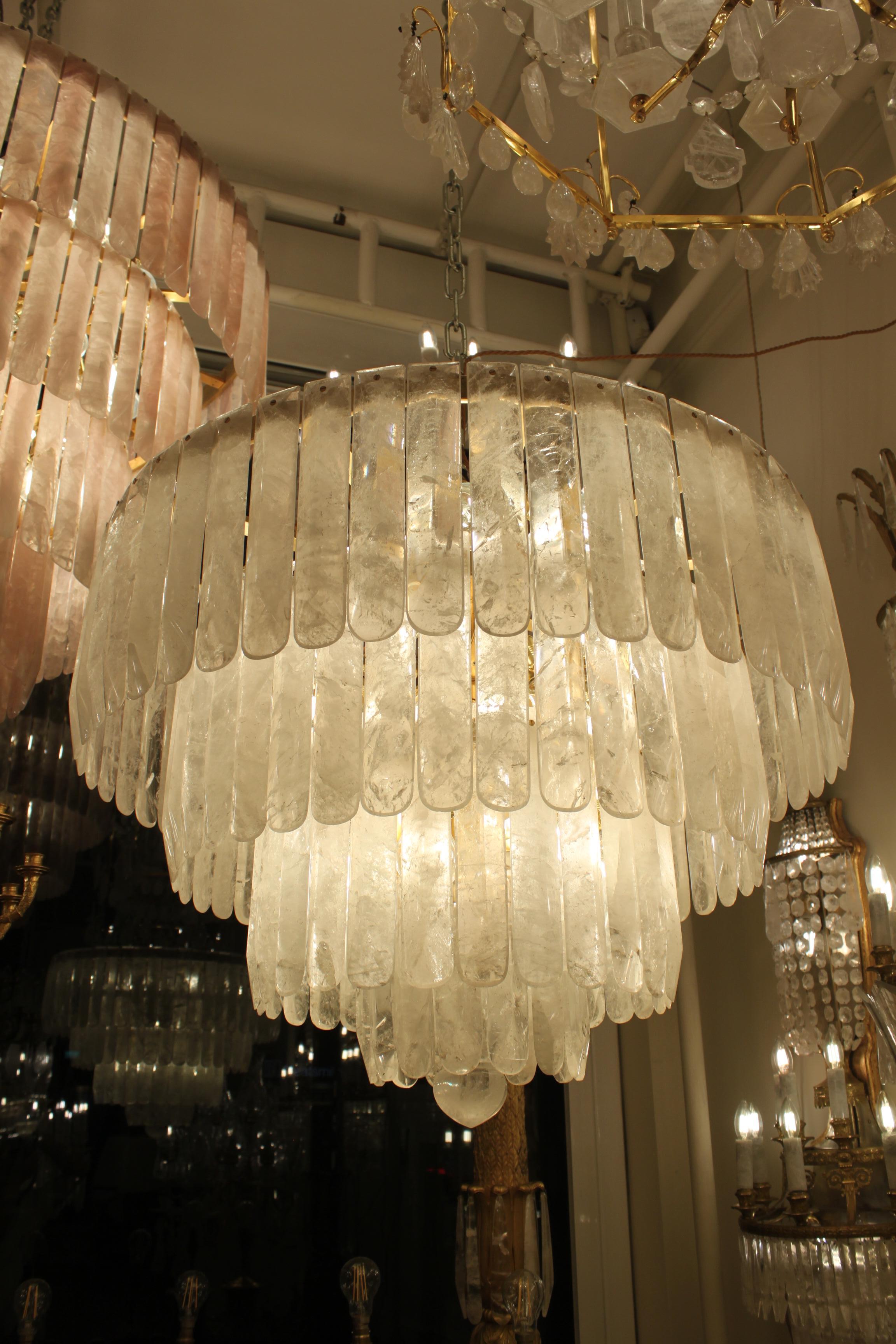 British Spectacular Pair of Circular Tiered Rock Crystal Chandeliers For Sale