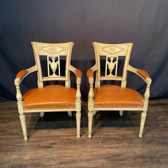 Spectacular Pair of French Neoclassical Figural Leather Armchairs