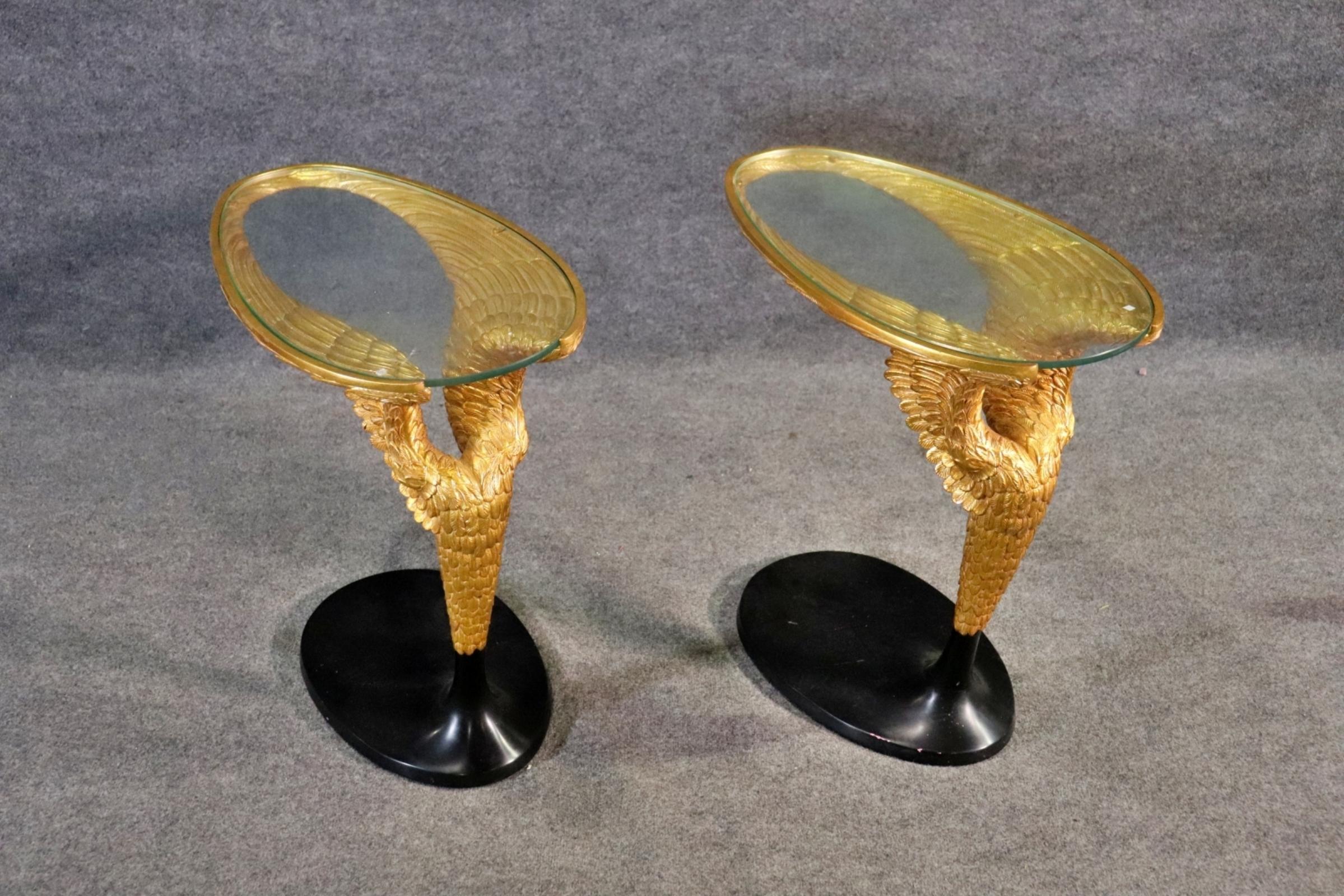 Jonathon Charles style carved walnut Empire winged sofa- end tables pair. Metal base, gold gilt wings with glass tops. does show minor scratches and finish loss

DImensions: 26 1/2