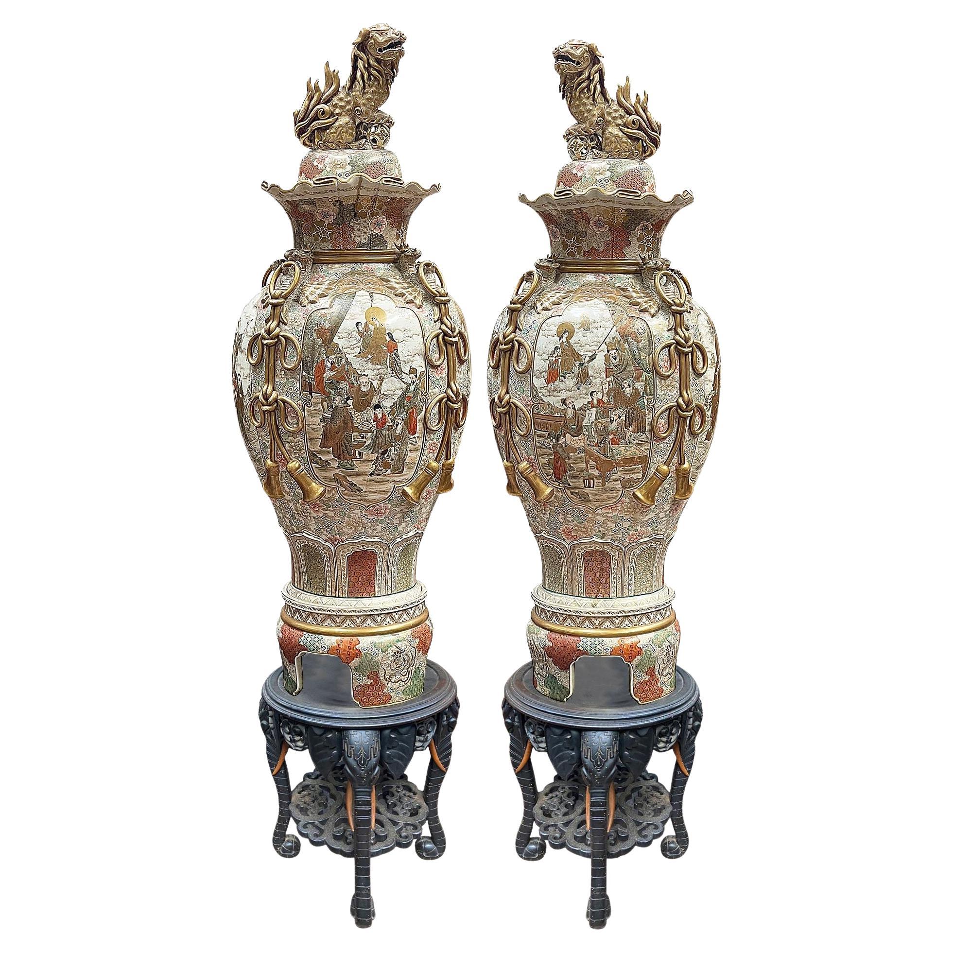 Spectacular pair of Japanese Satsuma lidded vases, circa 1890, on stands. 200cm