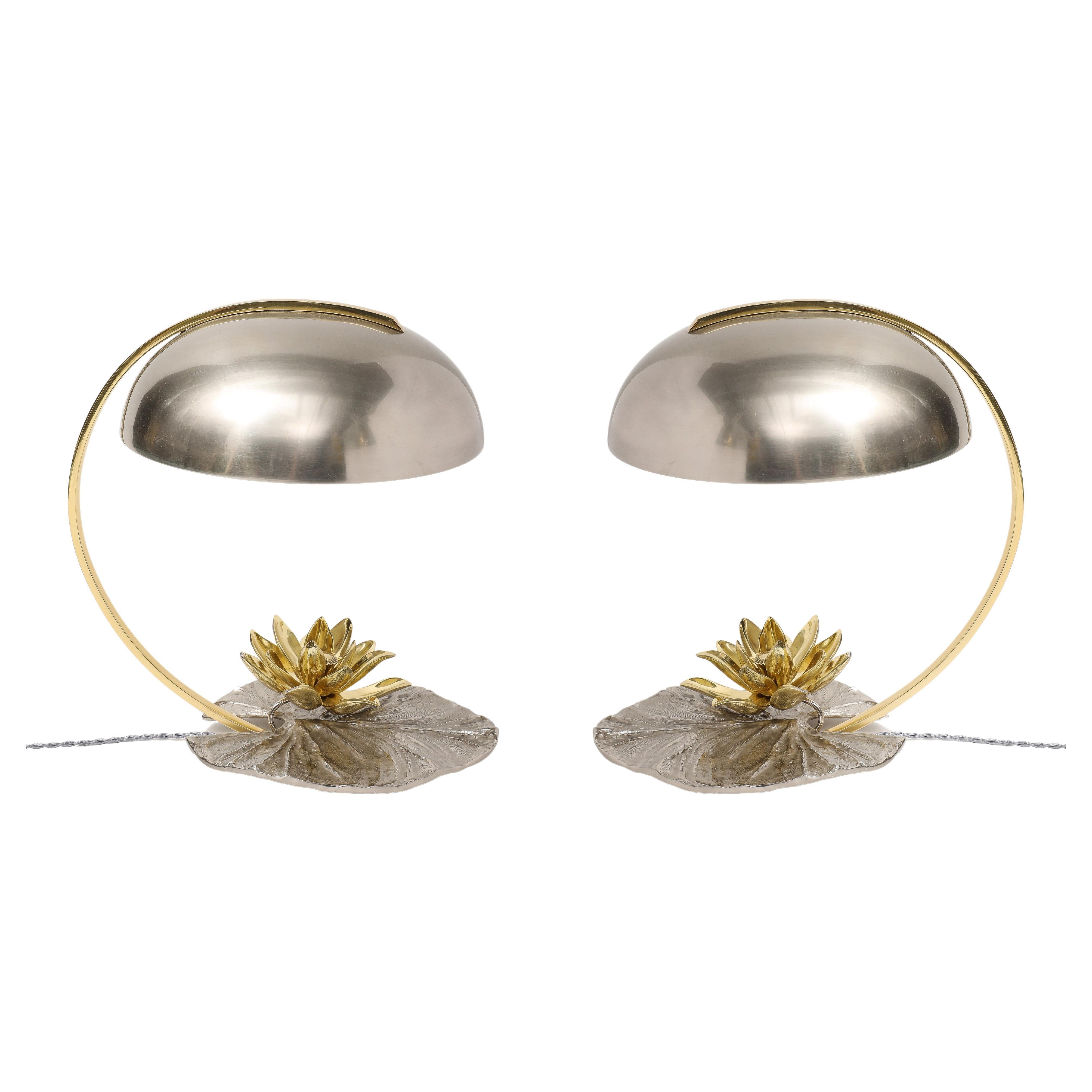 This pair is rare. The lamps were professionally refinished. The contrast between the silvered chrome finish and the gilt gives a magnificent contemporary style.